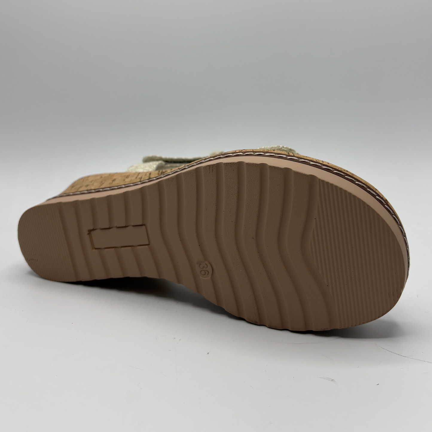 Brown sandal sole on a white background