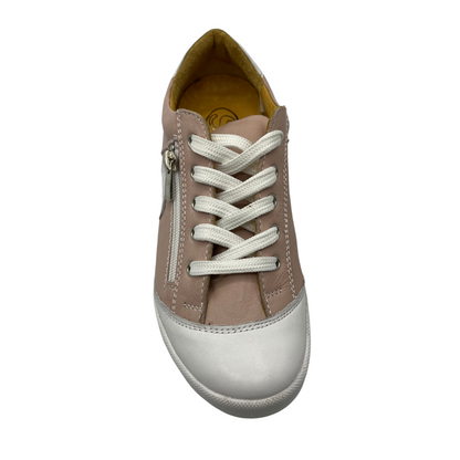 Top view of pink leather sneaker with white rubber outsole. White leather toe cap and laces.