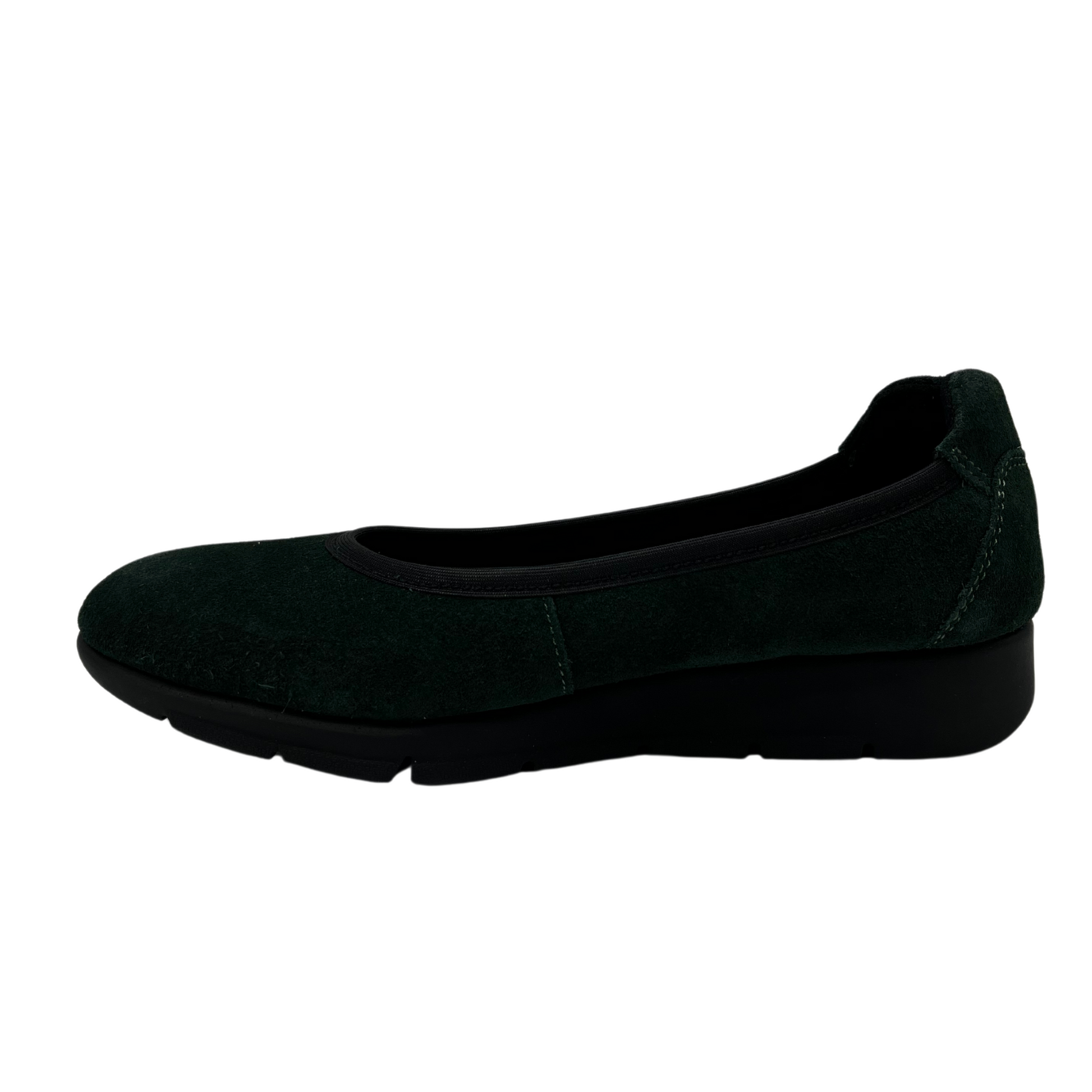 Left facing view of suede green low wedge shoe with rounded toe and black outsole