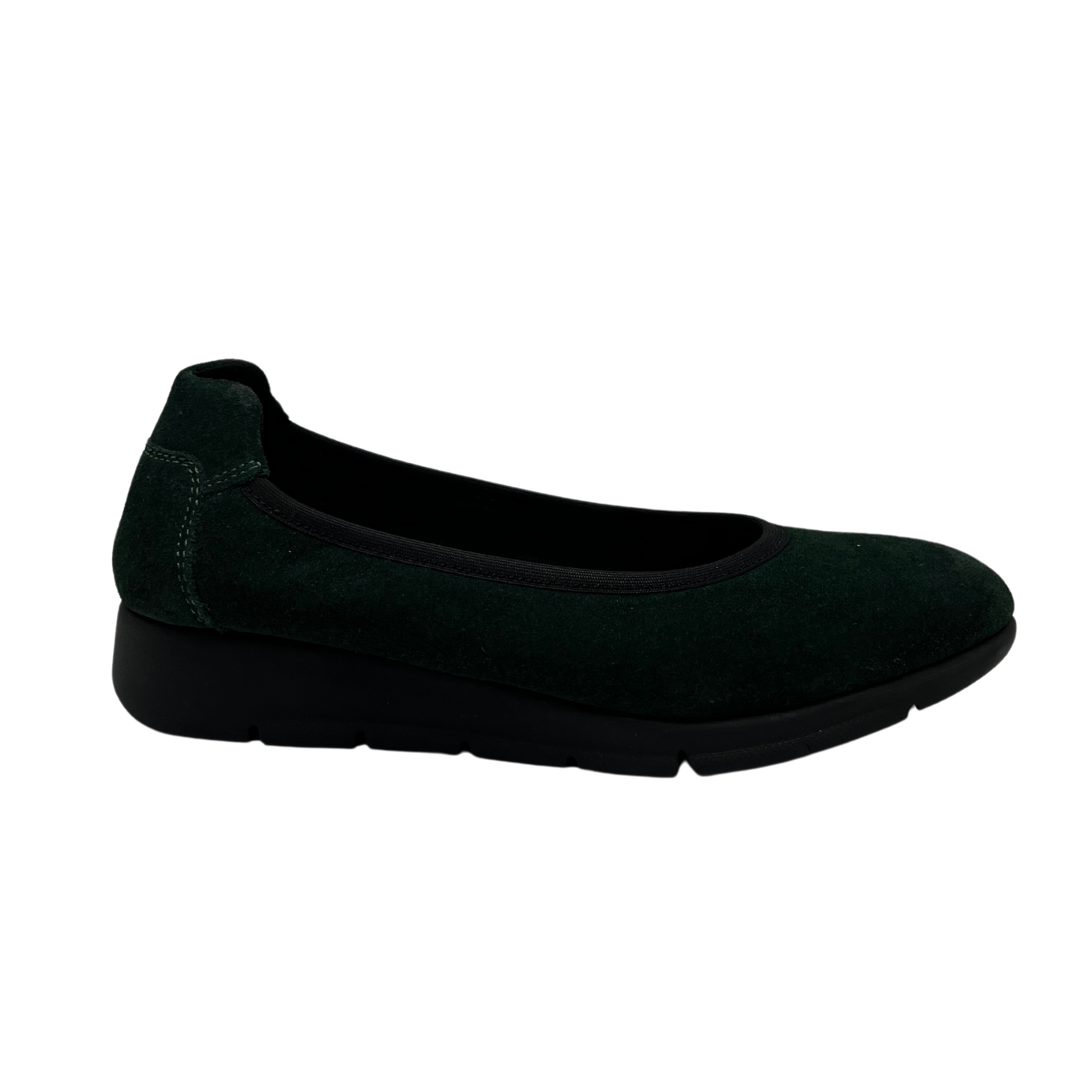 Right facing view of suede green low wedge shoe with rounded toe and black outsole