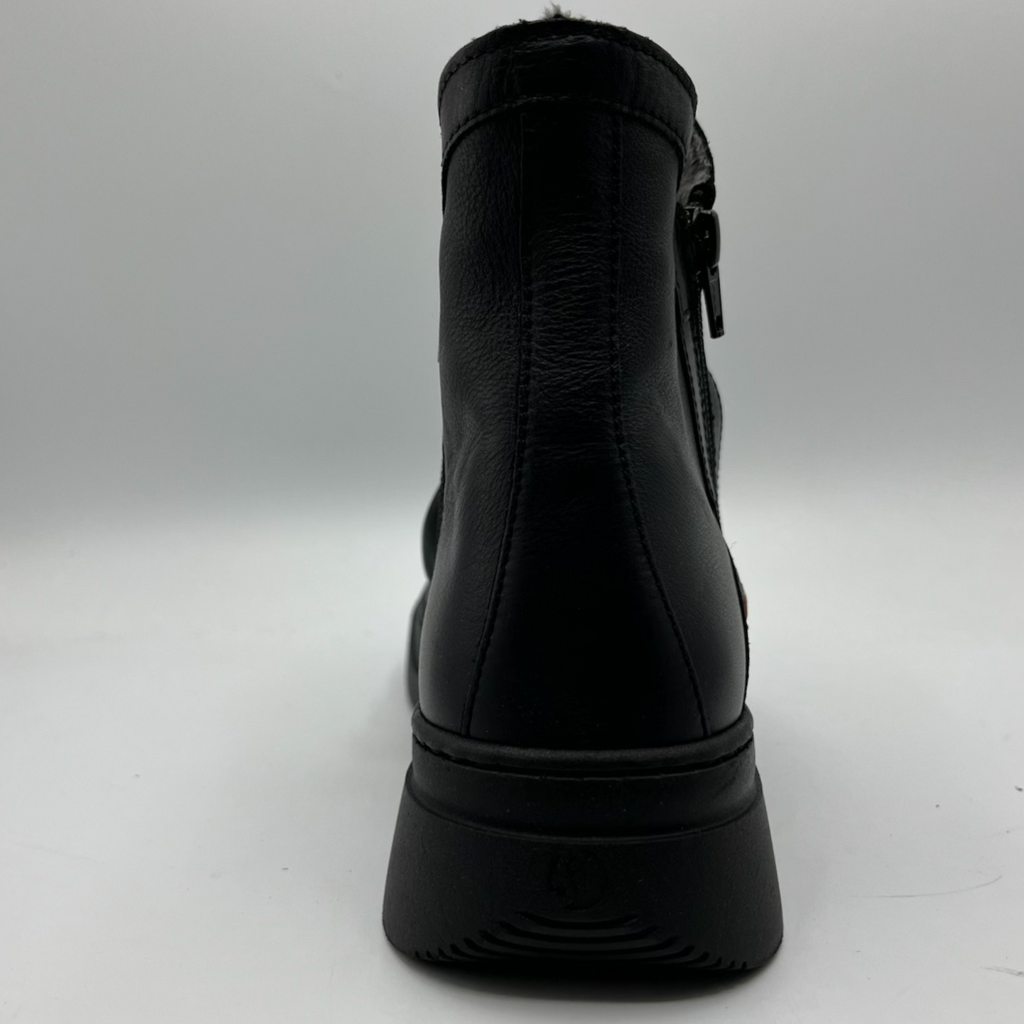 Black boot on a white background