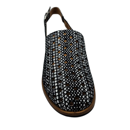 Front view of perforated leather shoe with slingback strap, low heel and rounded toe