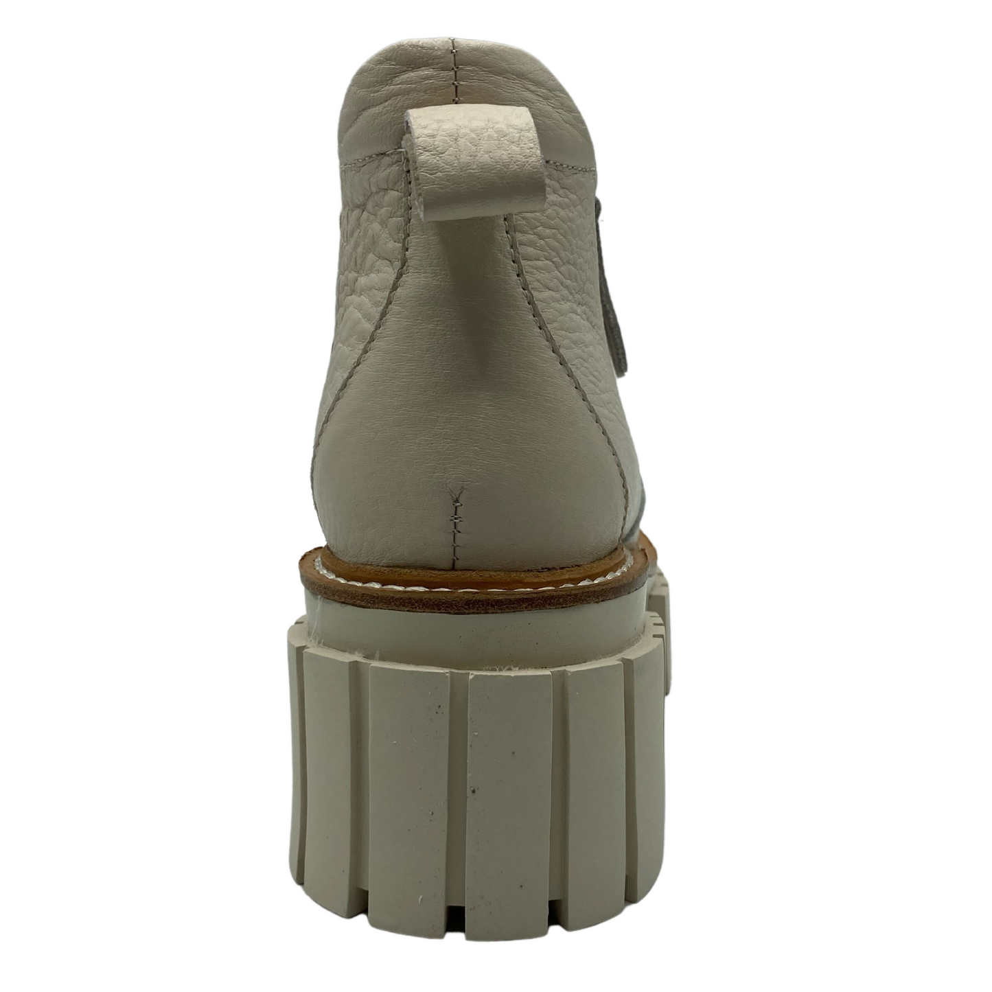 Heel view of leather ankle boot with rear pull tab and chunky rubber outsole