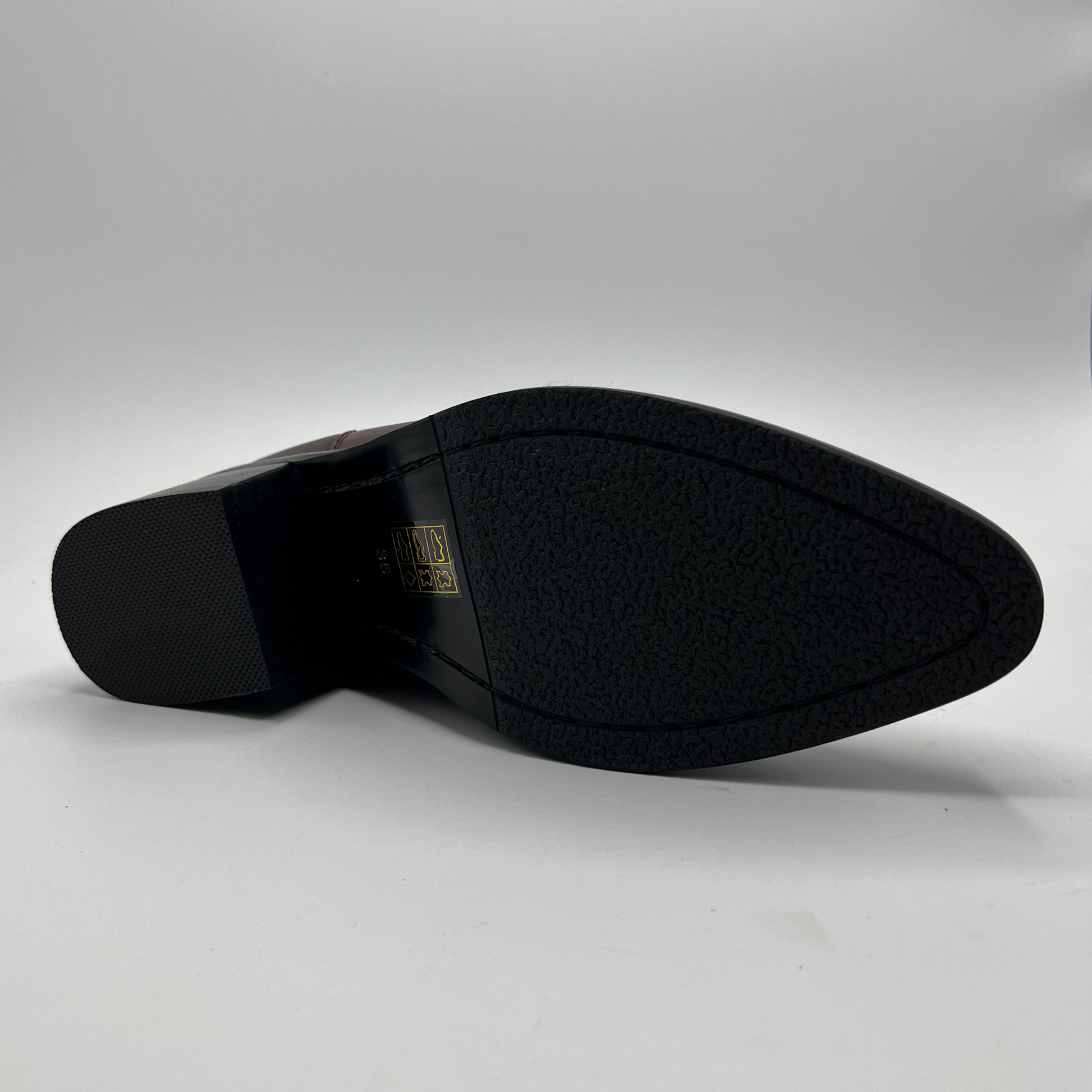 Black shoe sole on a white background