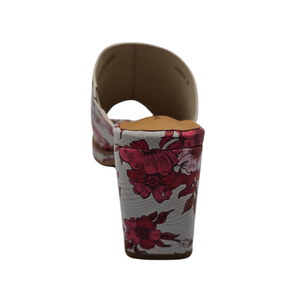 Back view of bold floral slip on sandal with wrapped block heel and cushioned footbed.