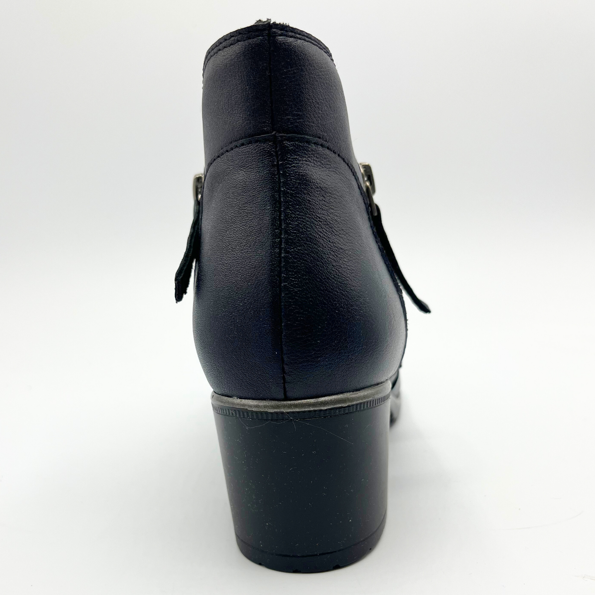 Black leather boot on a white background