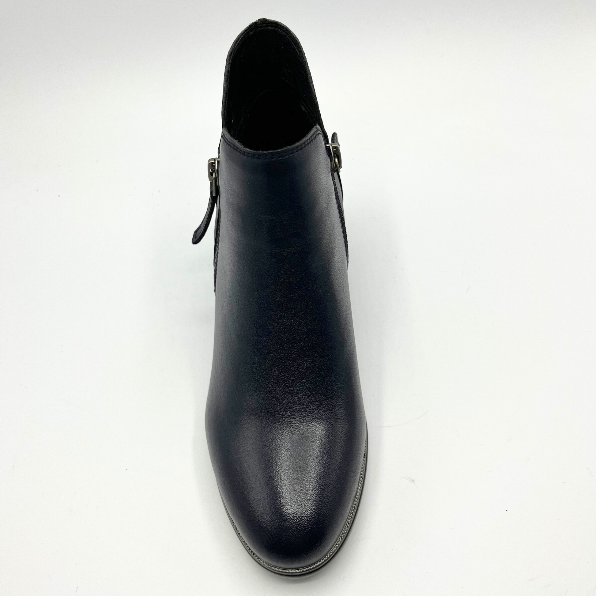 Black ankle boot on a white background
