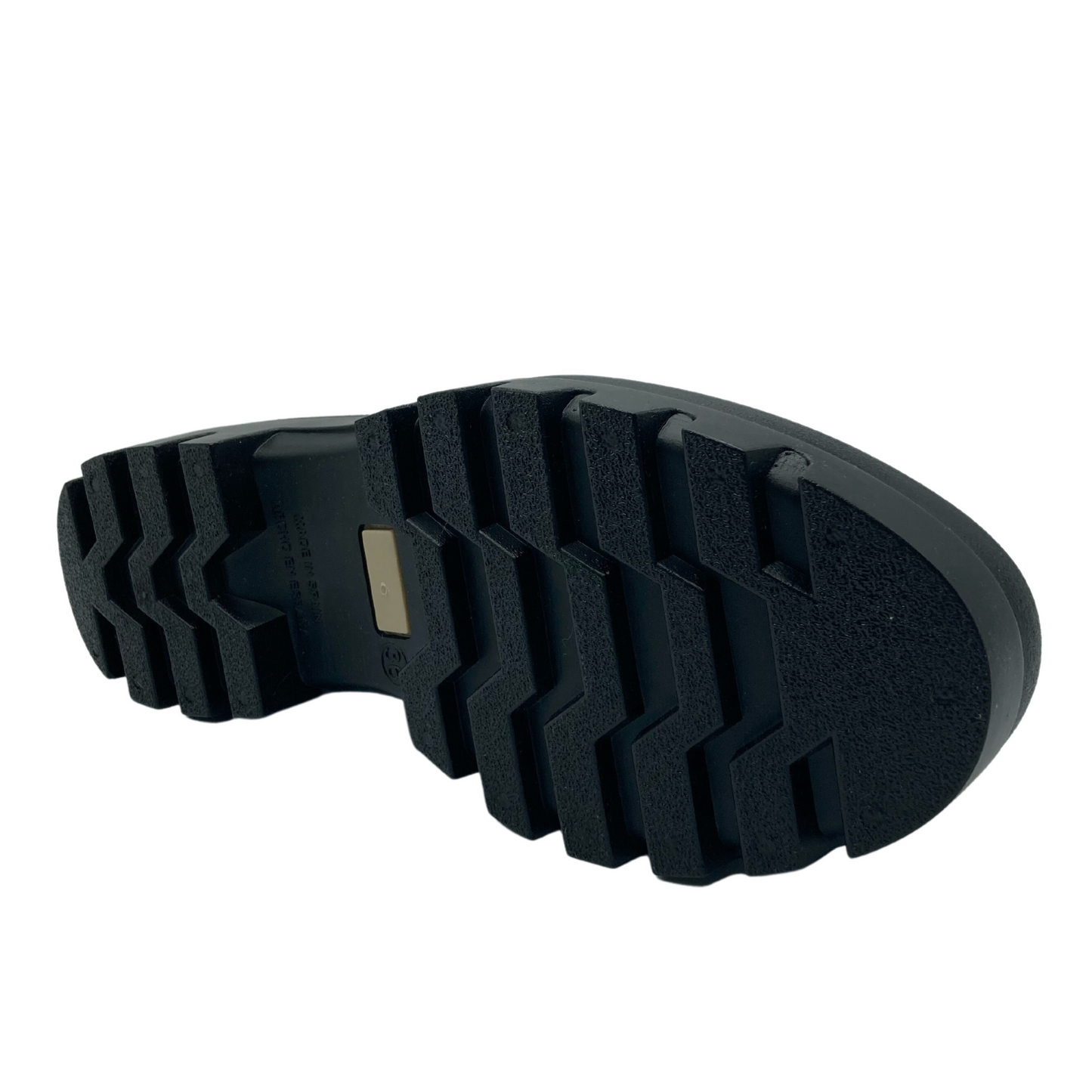 Bottom view of short chelsea boot with black rubber non-slip sole