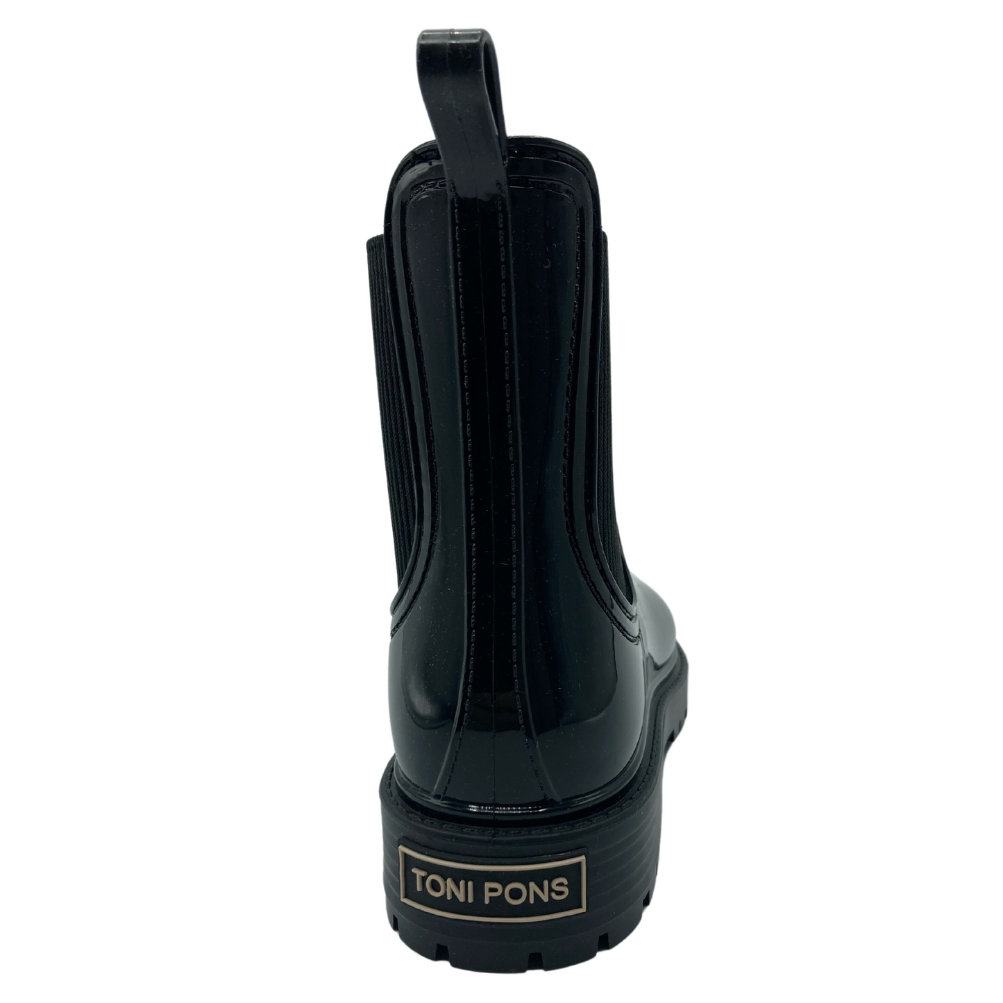 Heel view of glossy black short rain boot with black rubber outsole