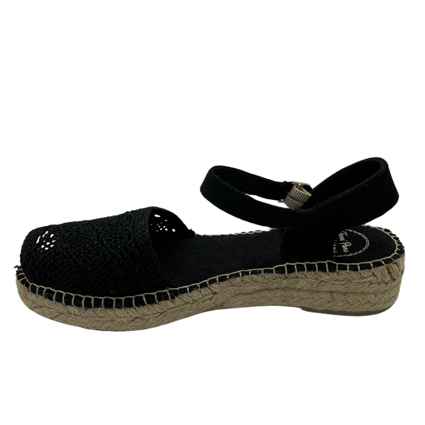 Left facing view of black macrame sandal with peep toe and buckle ankle strap