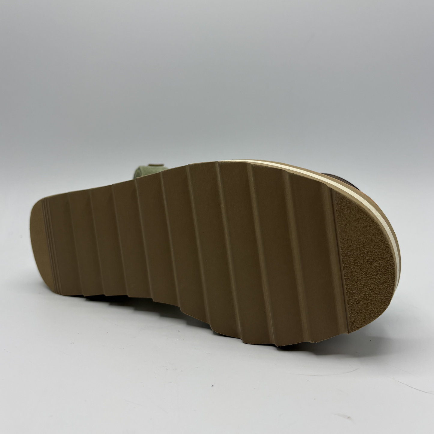 Brown sandal sole on a white background