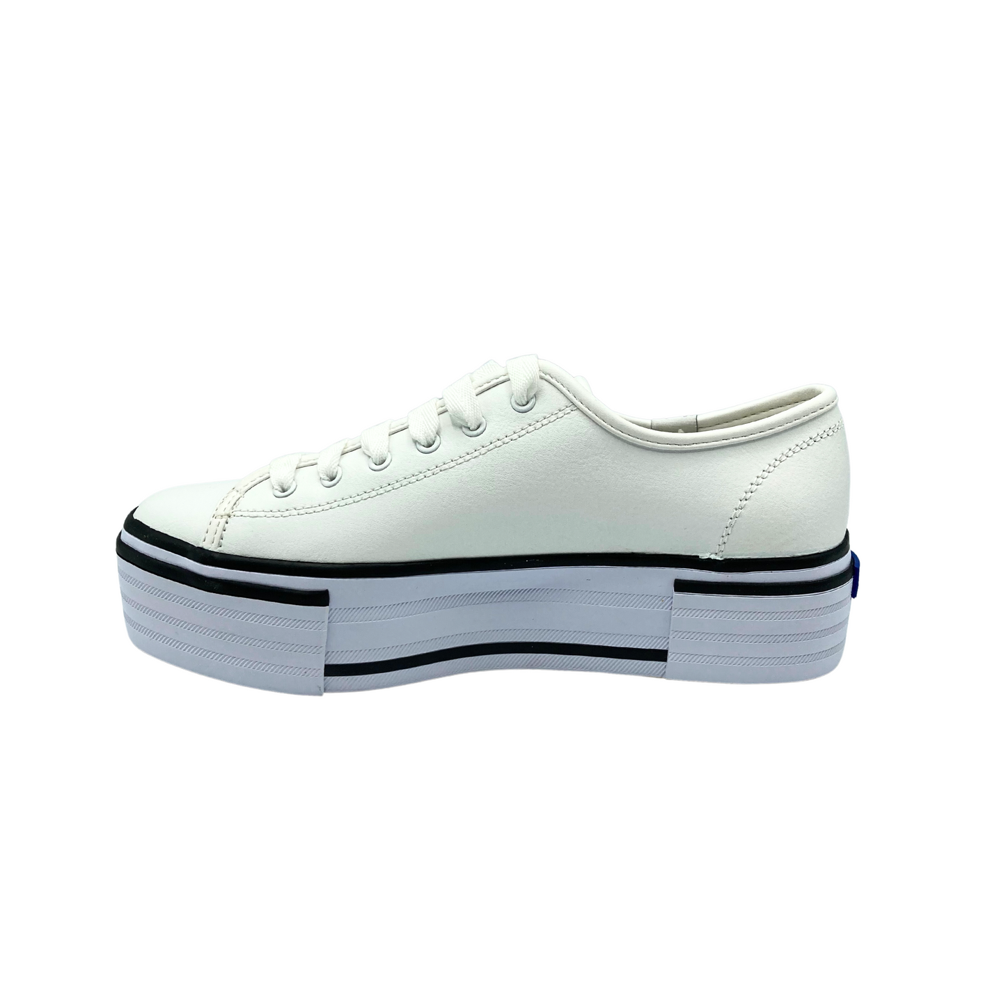 Inside view of a white leather sneaker with a platform sole. Outsole has dark stripes for contrast