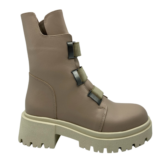 Right facing view of nude leather boot with chunky rubber sole and heel
