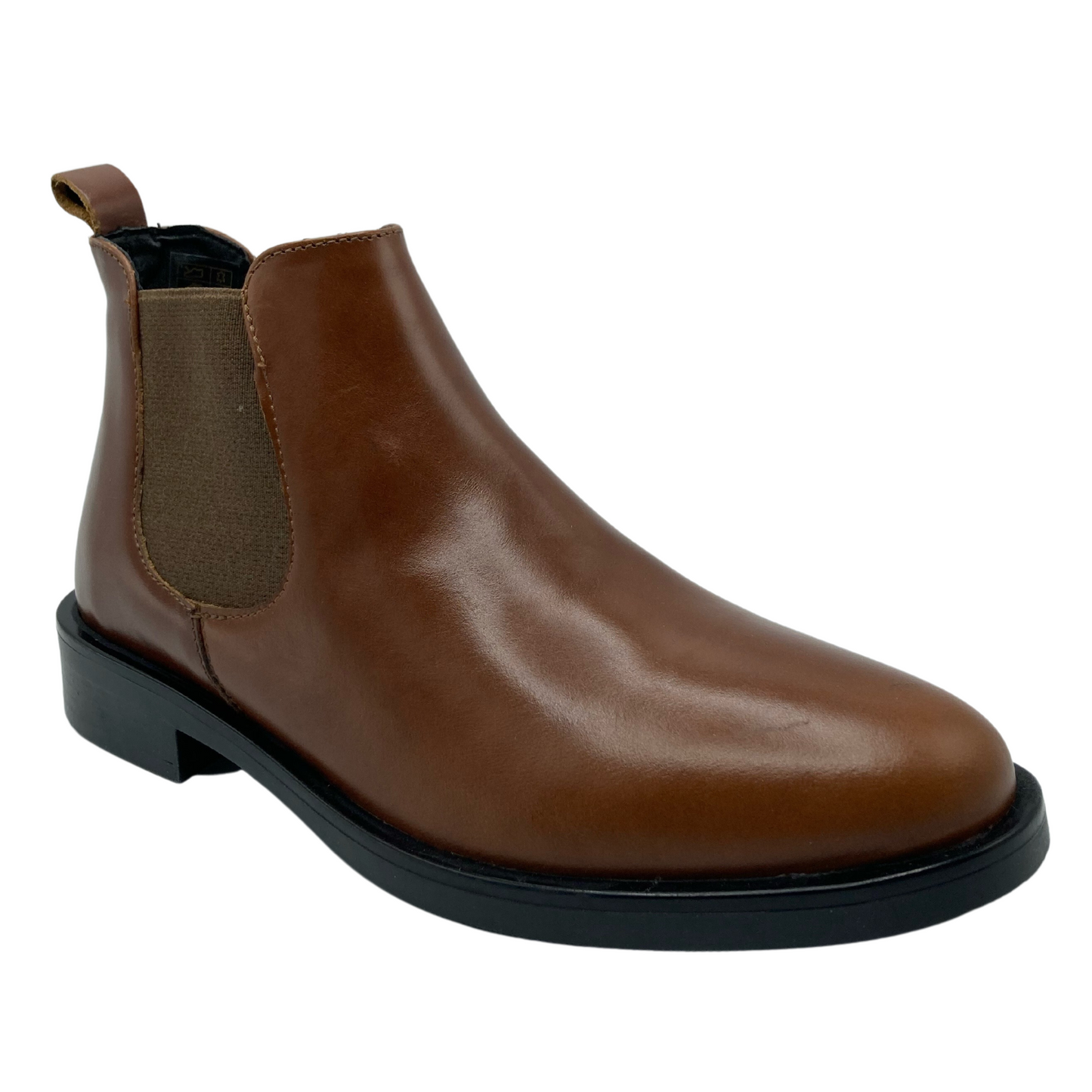 45 degree angled view of tan leather chelsea boot with almond toe and black outsole