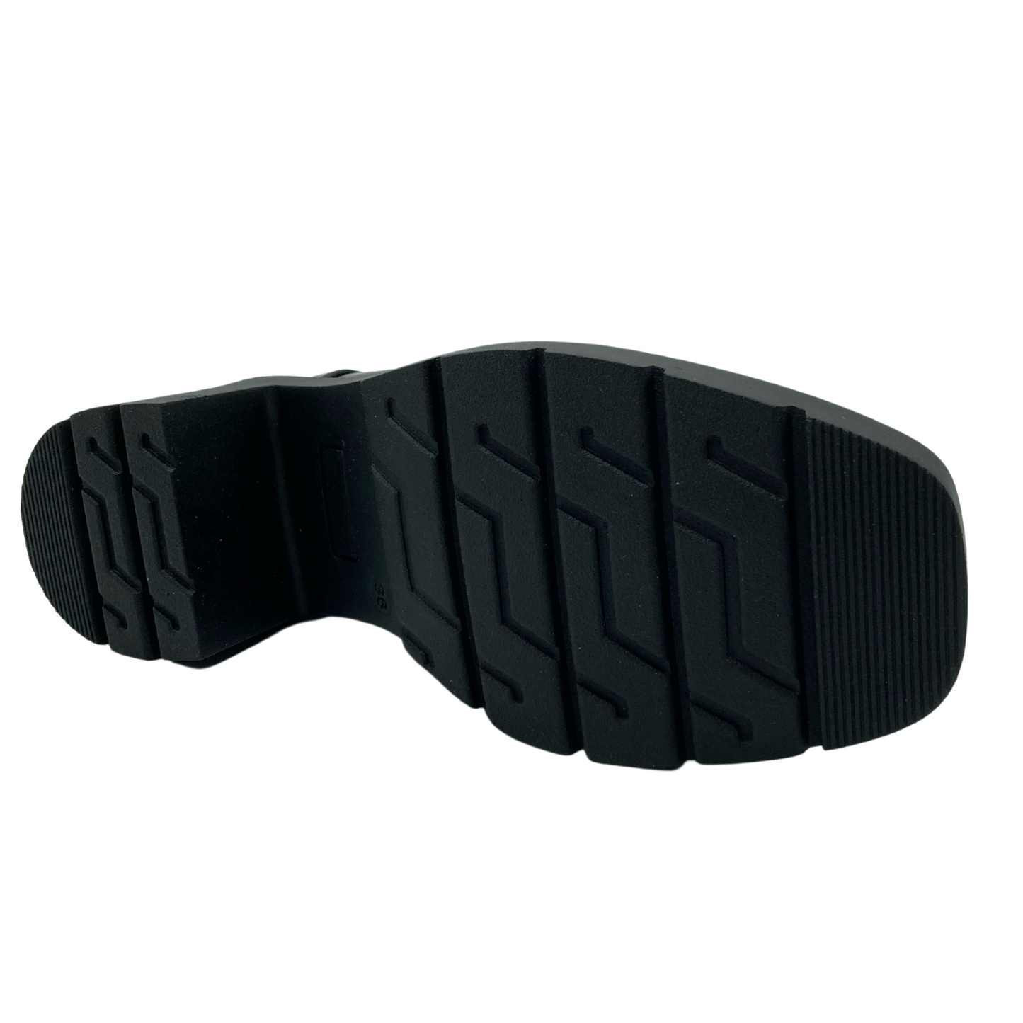 Bottom view of black patent leather boot with black rubber sole and heel