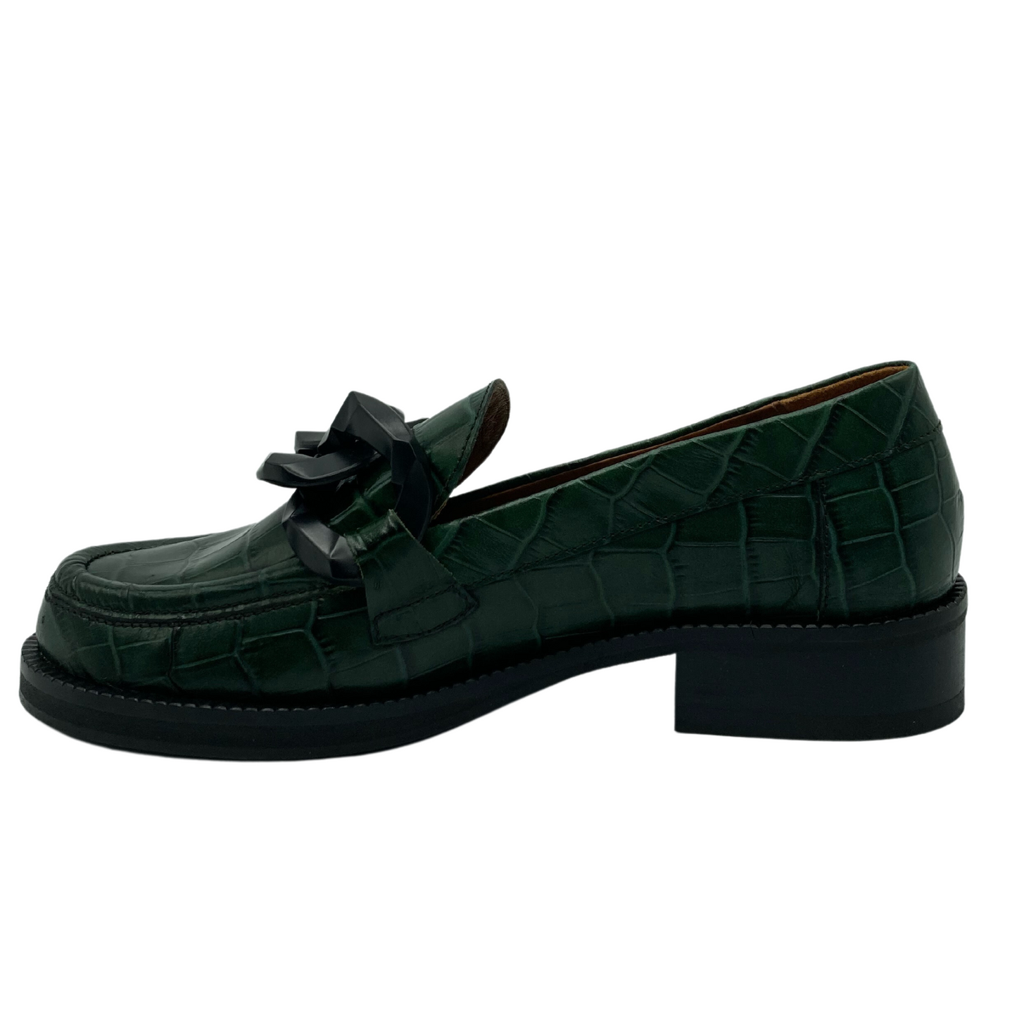 Left facing view of textured green leather loafer with short block heel and black outsole