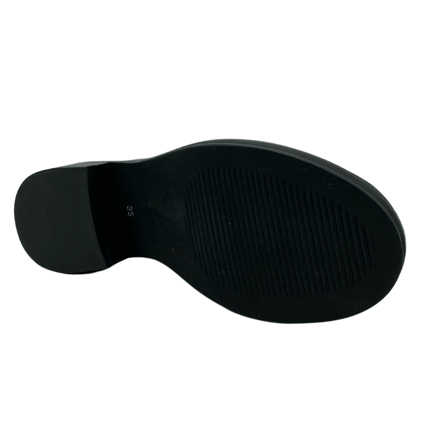Bottom view of leather loafer with black block heel and sole