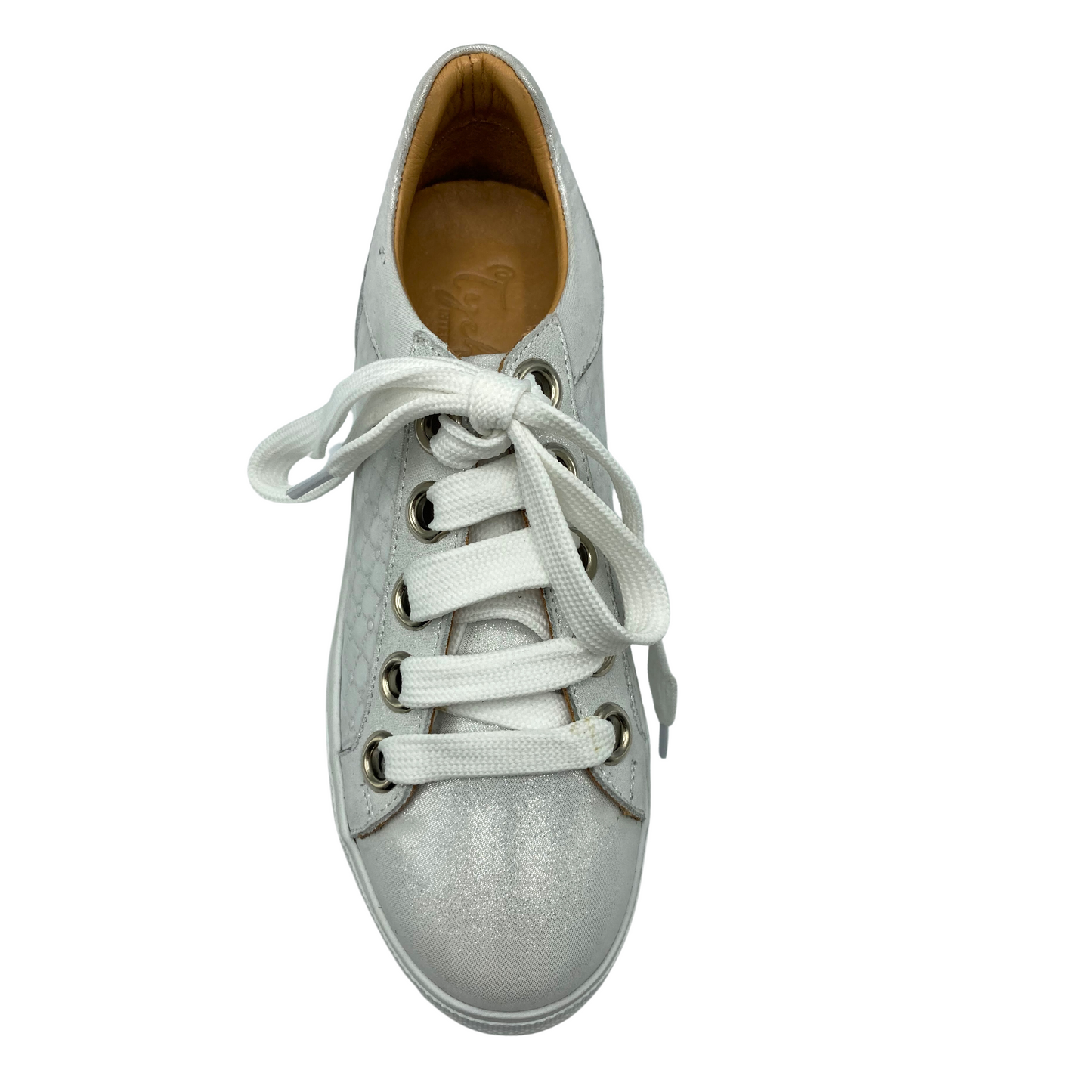 Top down view of a fashion sneaker in a gliiter grey with white laces
