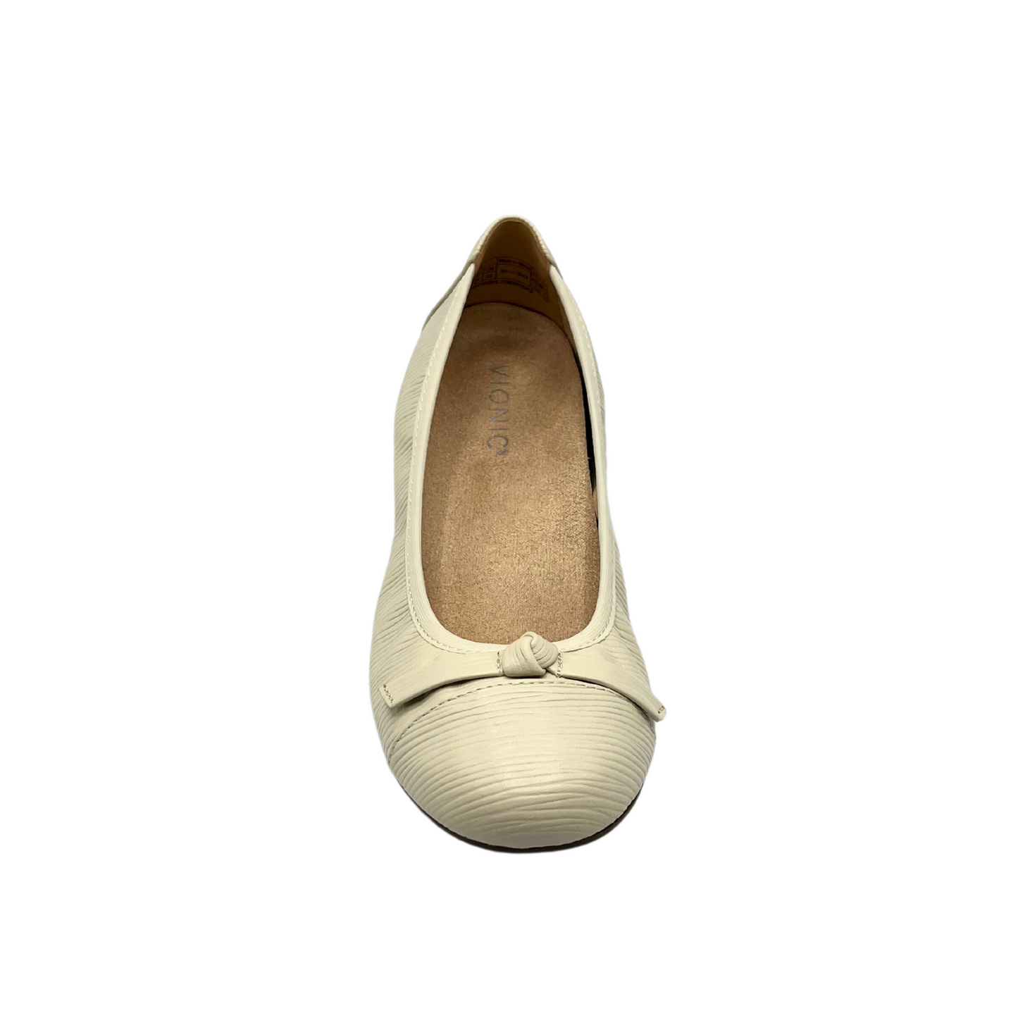 Top down view of a cream leather ballet flat. Leather is textured