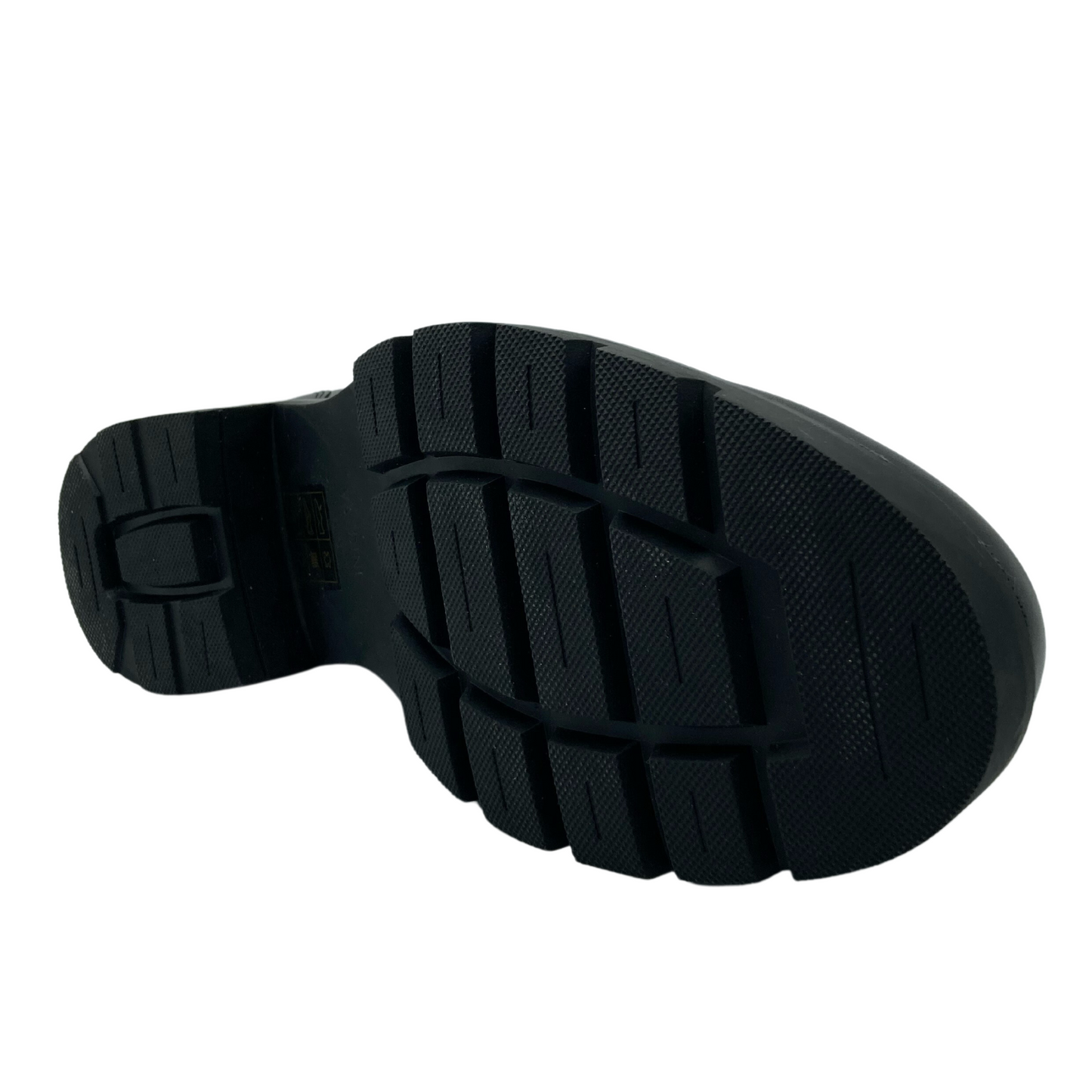 Bottom view of black leather loafer with rubber outsole