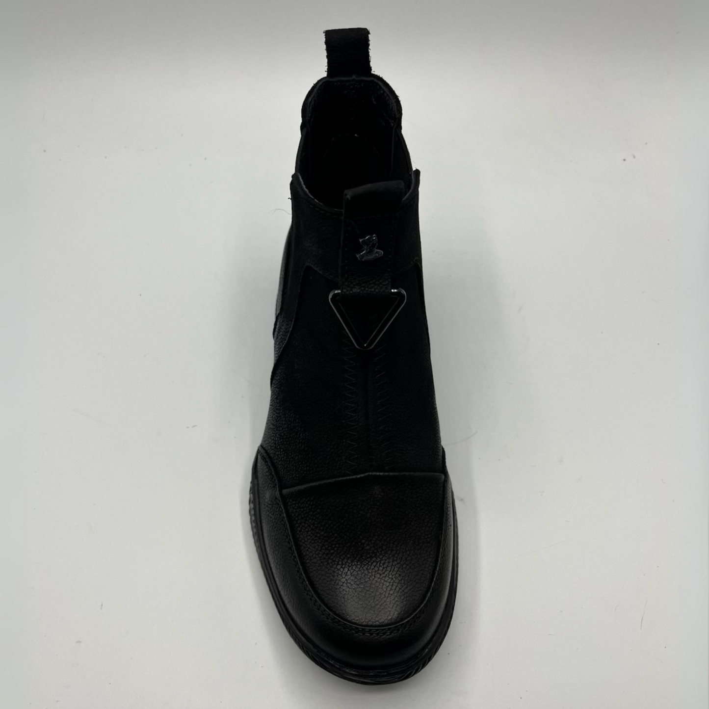 Black boot on a white background