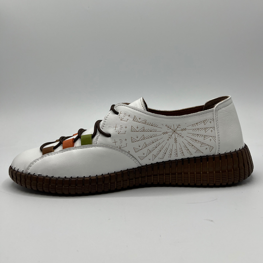 Left facing view of a white leather shoe with a light brown, very detailed design on the side. With elasticated laces and a brown outsole.
