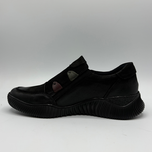 Left facing view of a black leather sneaker with a supportive outsole