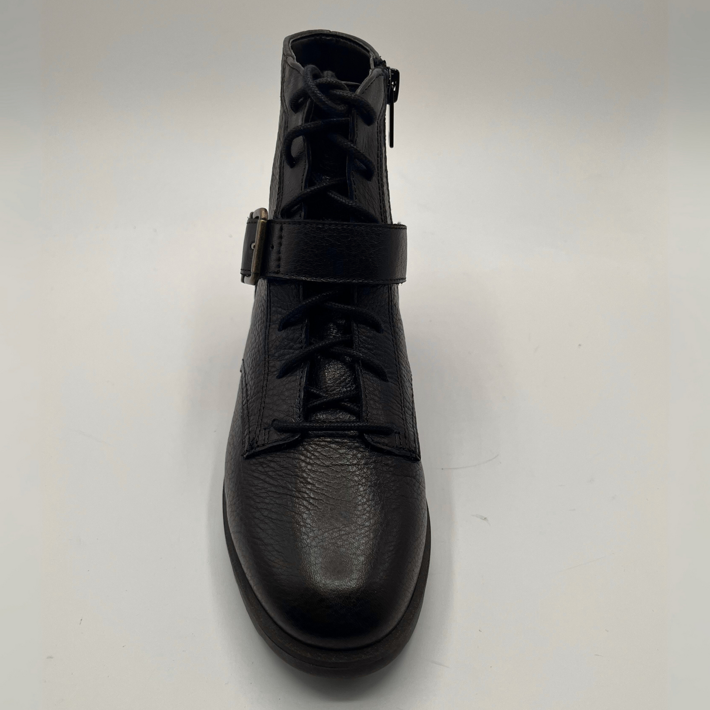 Top view of a black leather ankle boot.