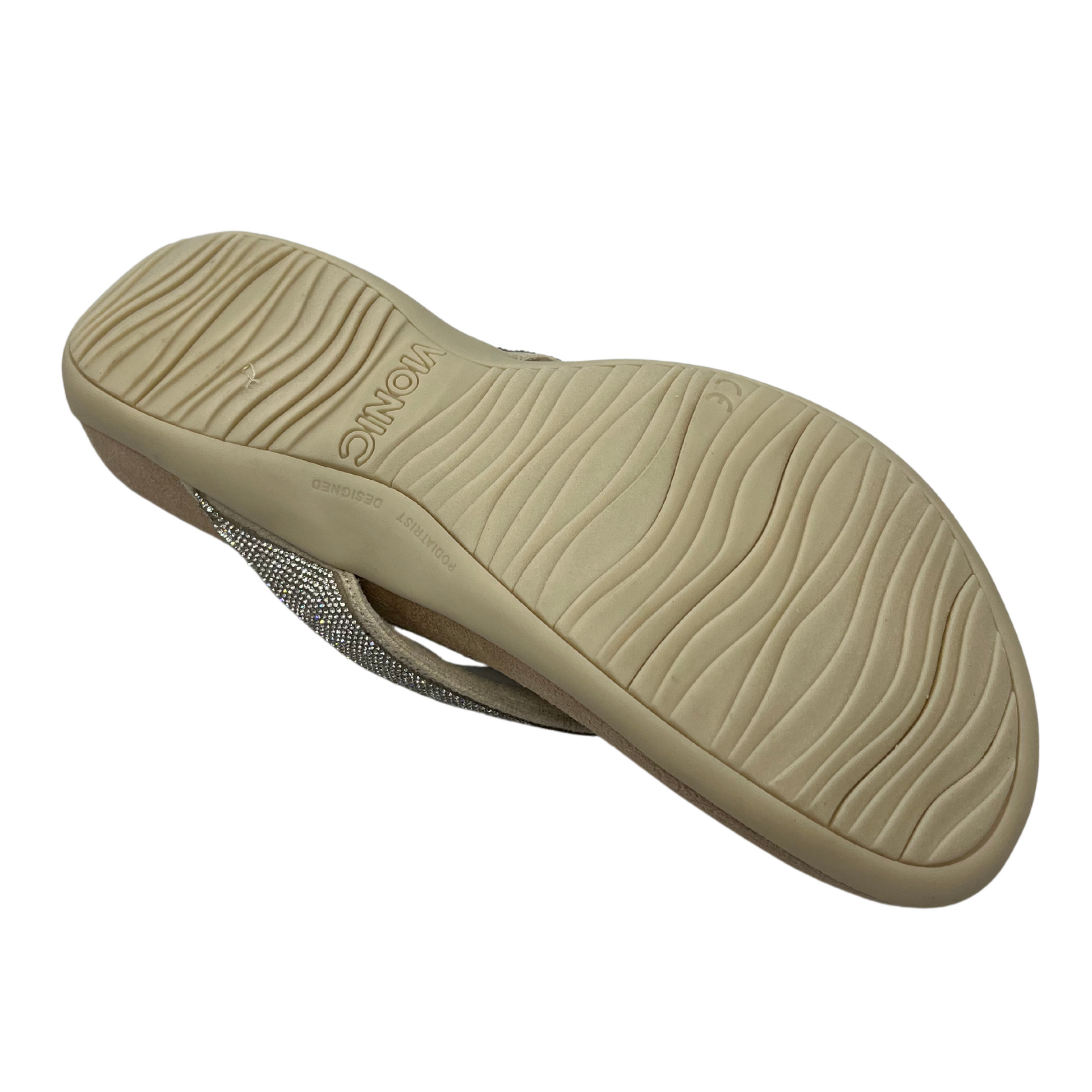 Bottom view of brown and silver sandal with crystal straps and microfibre footbed