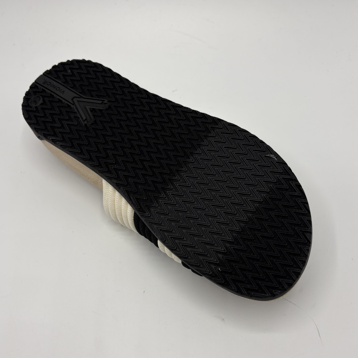 Black sole of a shoe on a white background