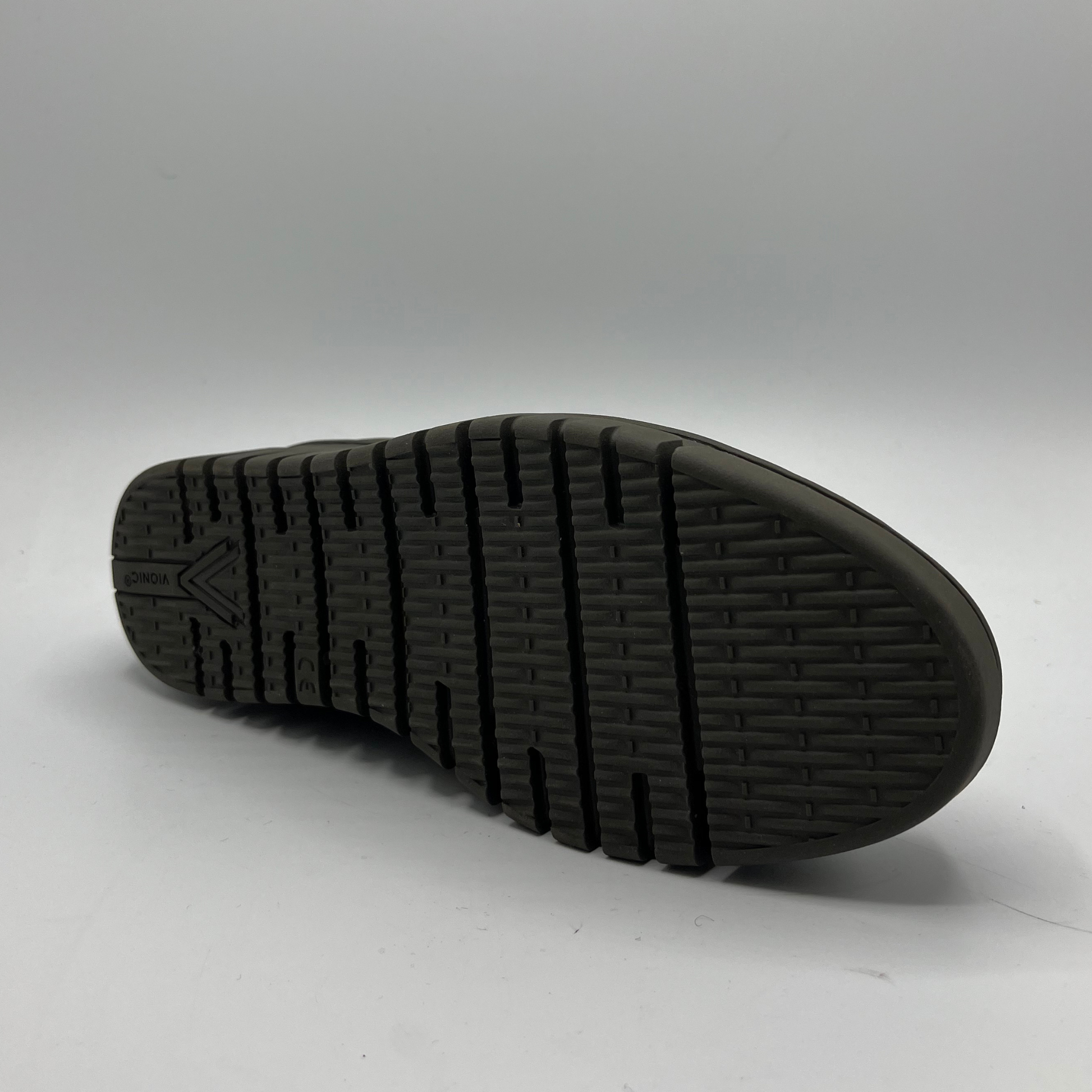Black sole of a shoe on a white background