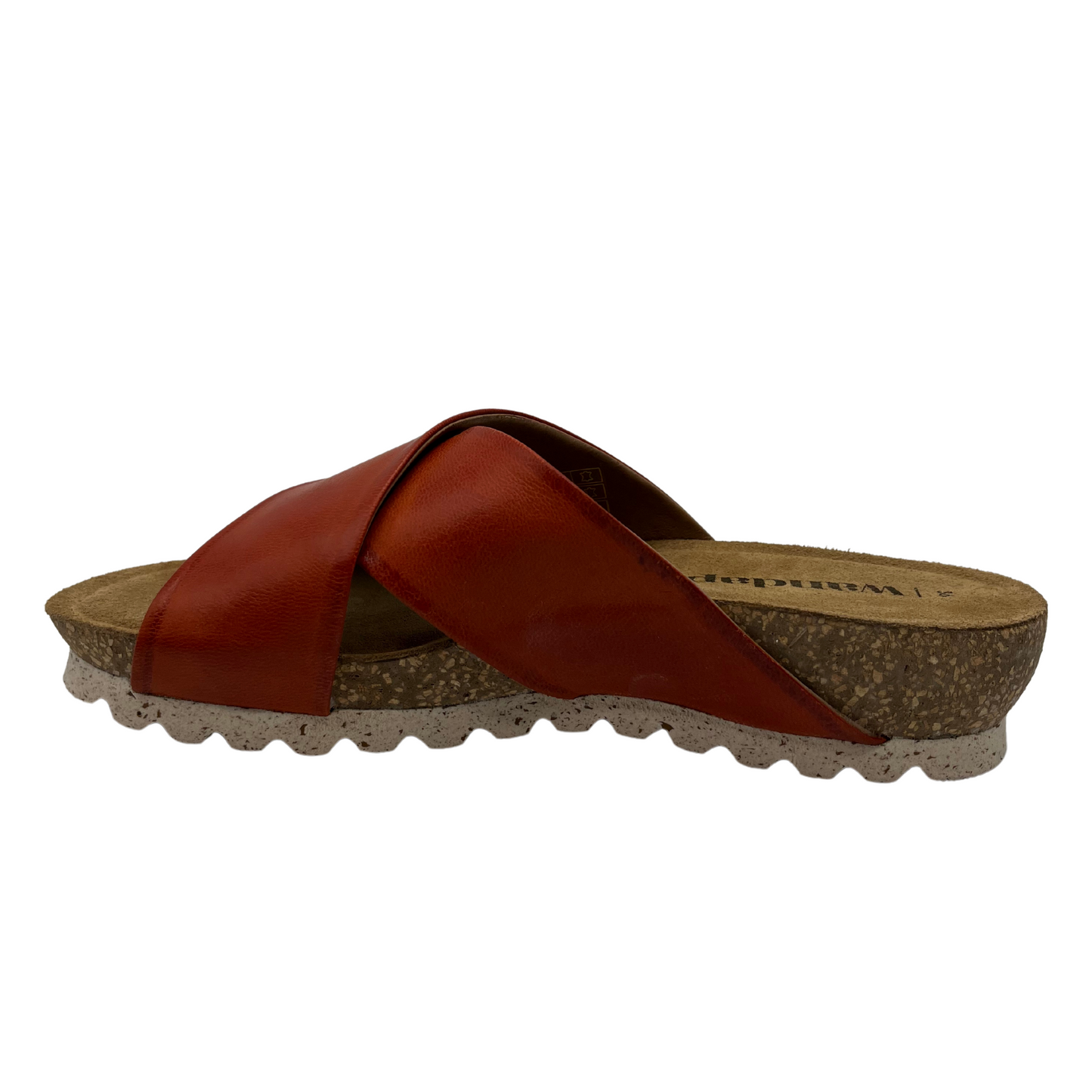 Left facing view of red leather sandal with criss cross straps