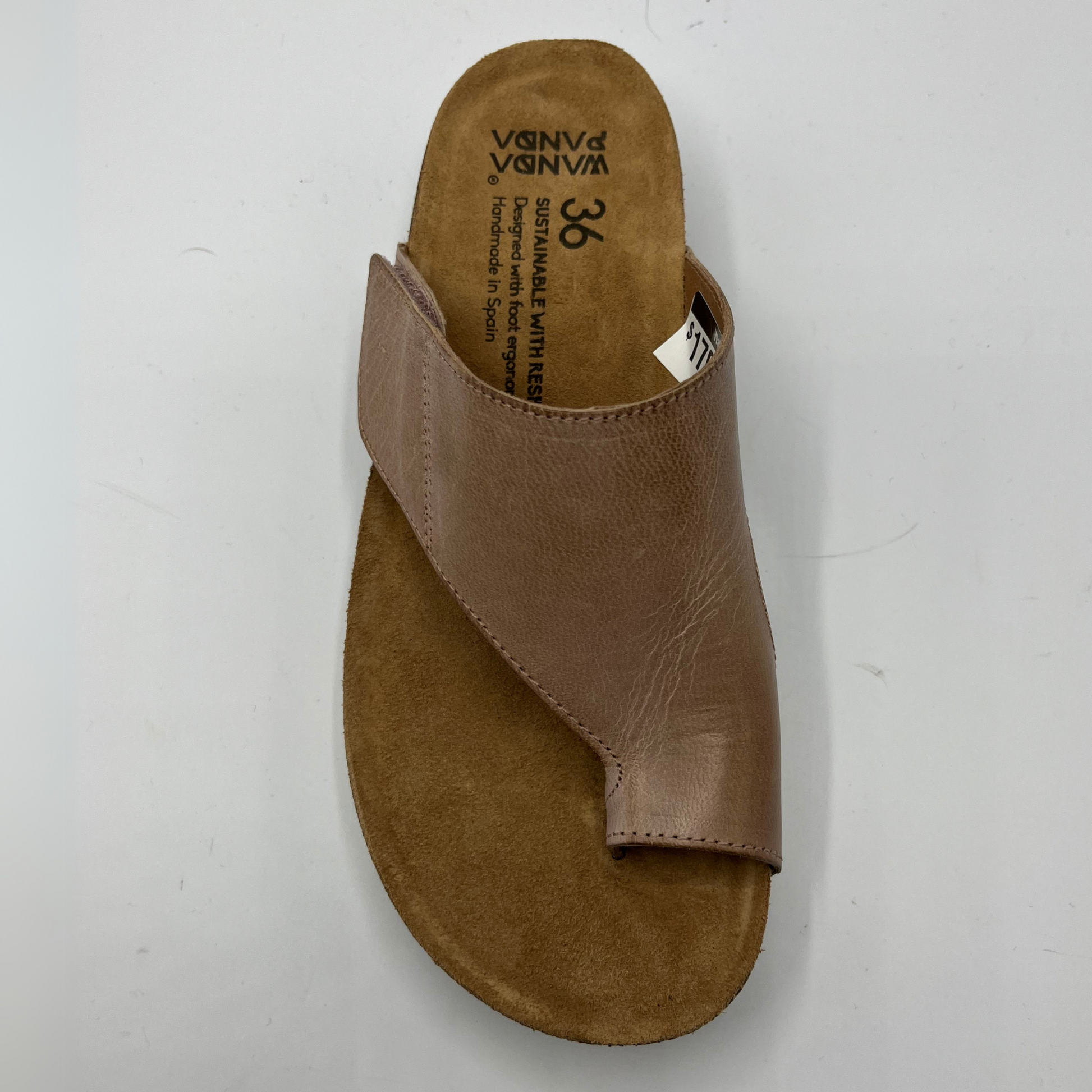 Top view of beige leather sandal with cork footbed