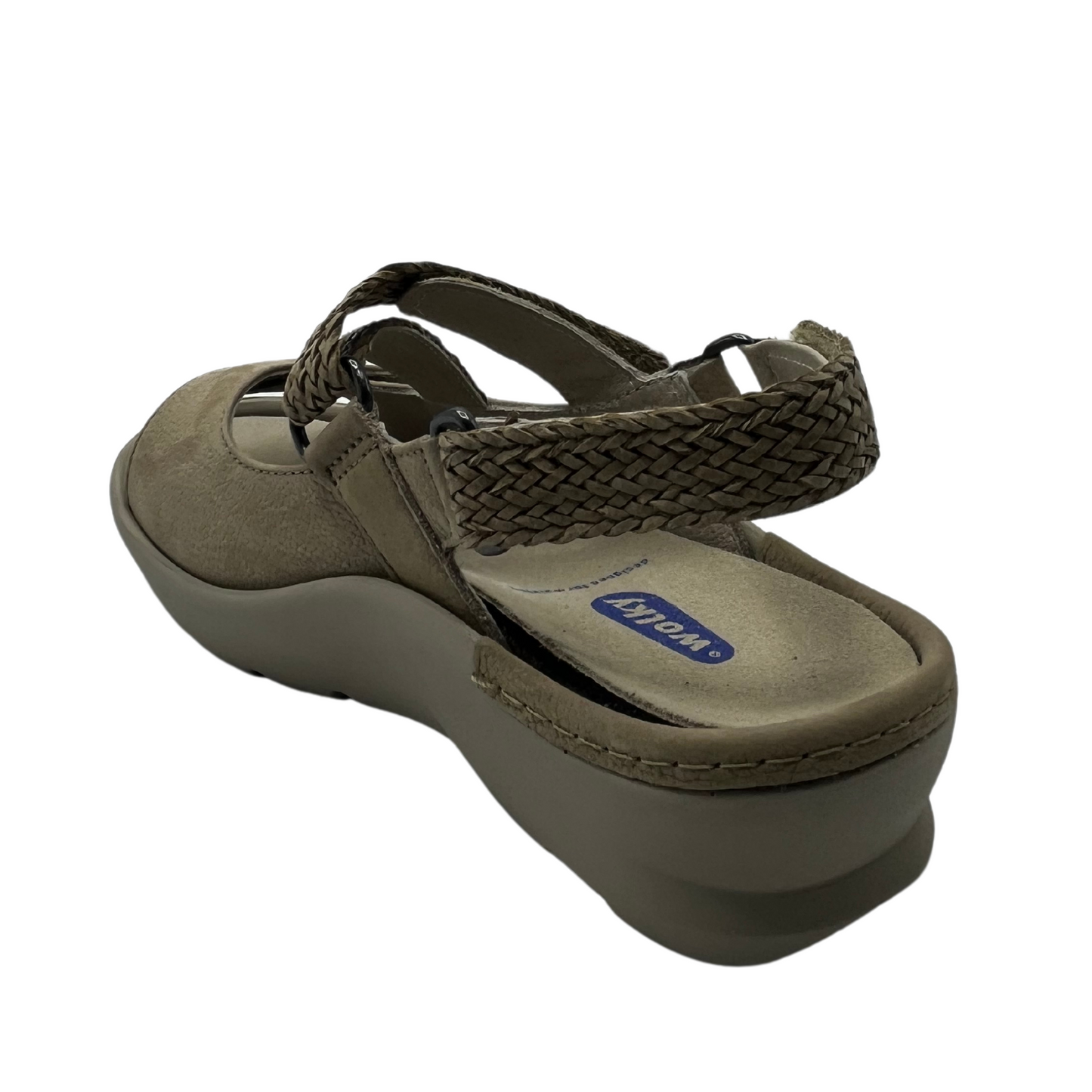 Back angled view of sand coloured sandals with braided style adjustable straps.