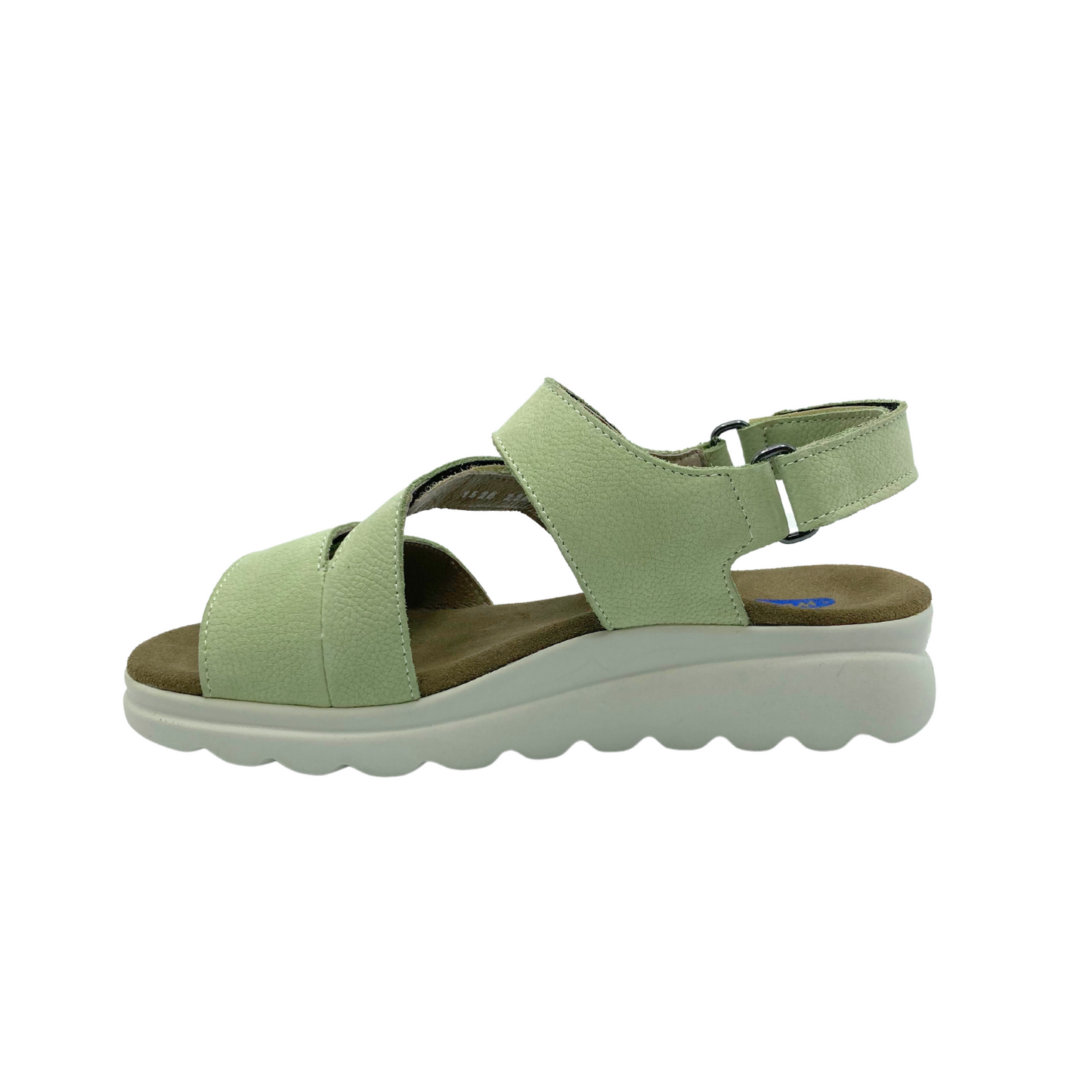 Inside view of a light green leather sandal with a natural color footbed and contrasting whtie outsole. Slight wedge