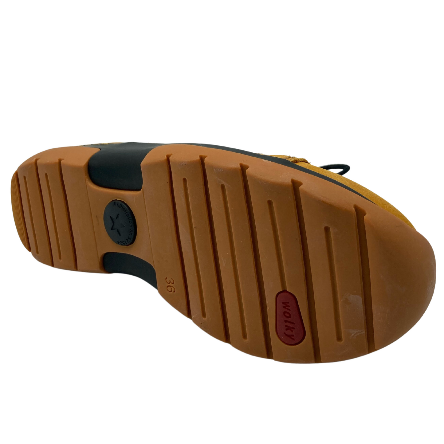 Bottom view of nubuck leather sneaker with thick rubber outsole