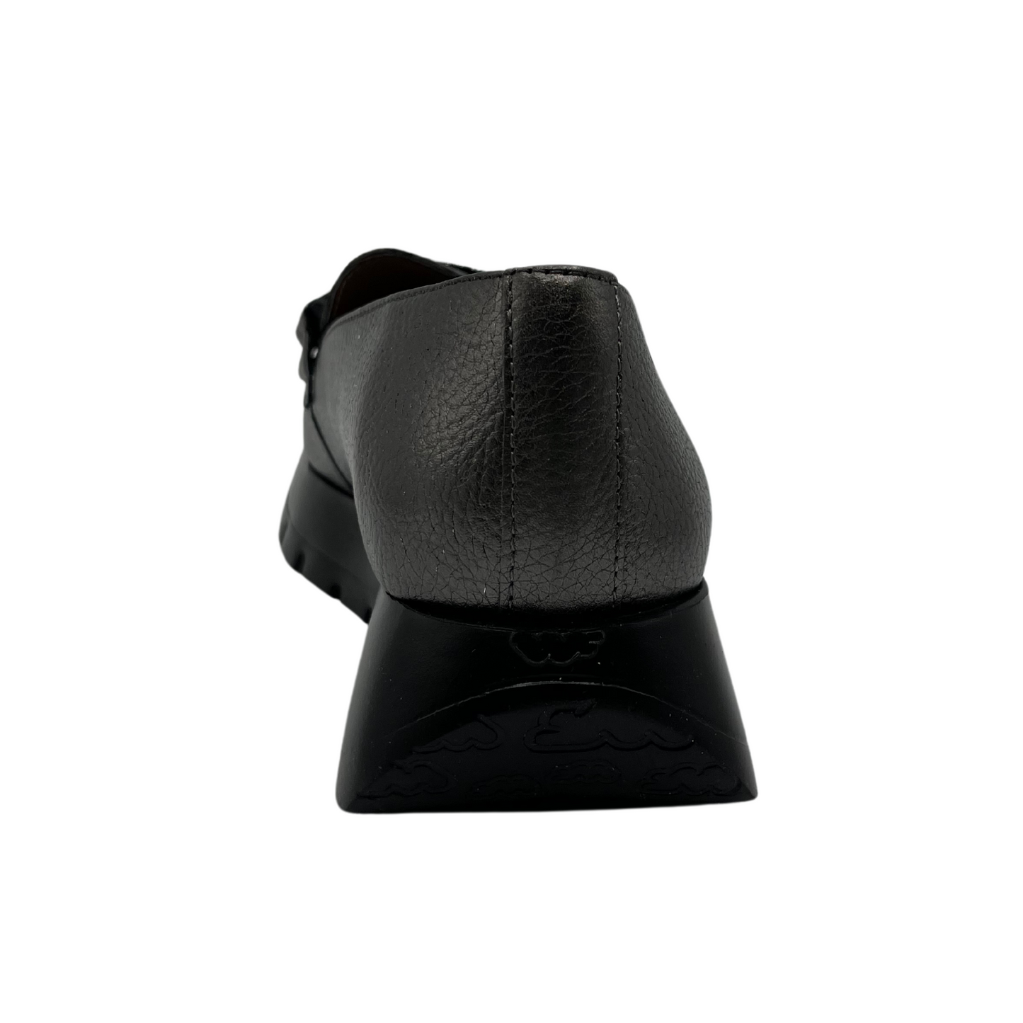 Back view of textured leather loafer in grey. A black thick platform sole and black embellishment on the upper