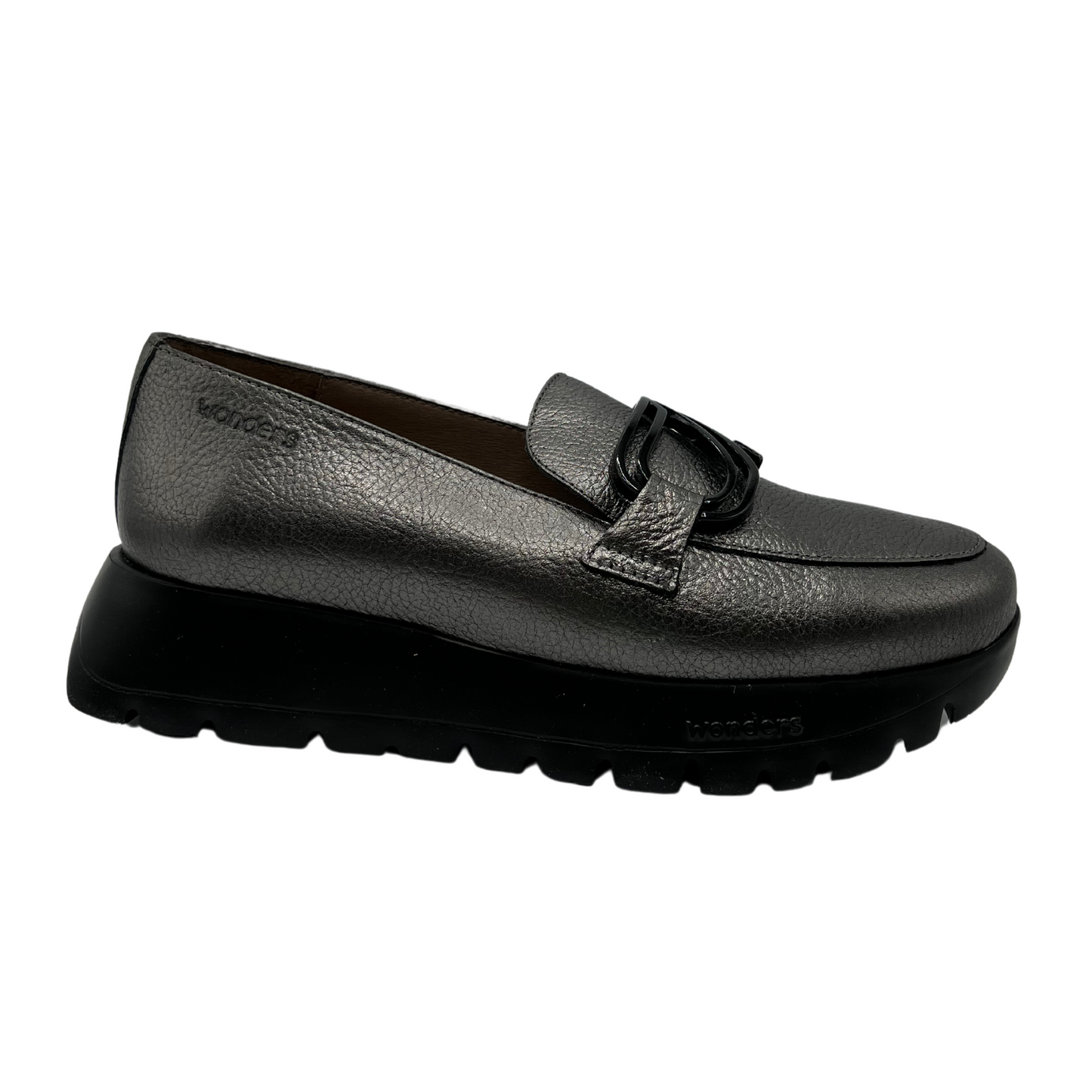 Right facing view of textured leather loafer in grey. A black thick platform sole and black embellishment on the upper
