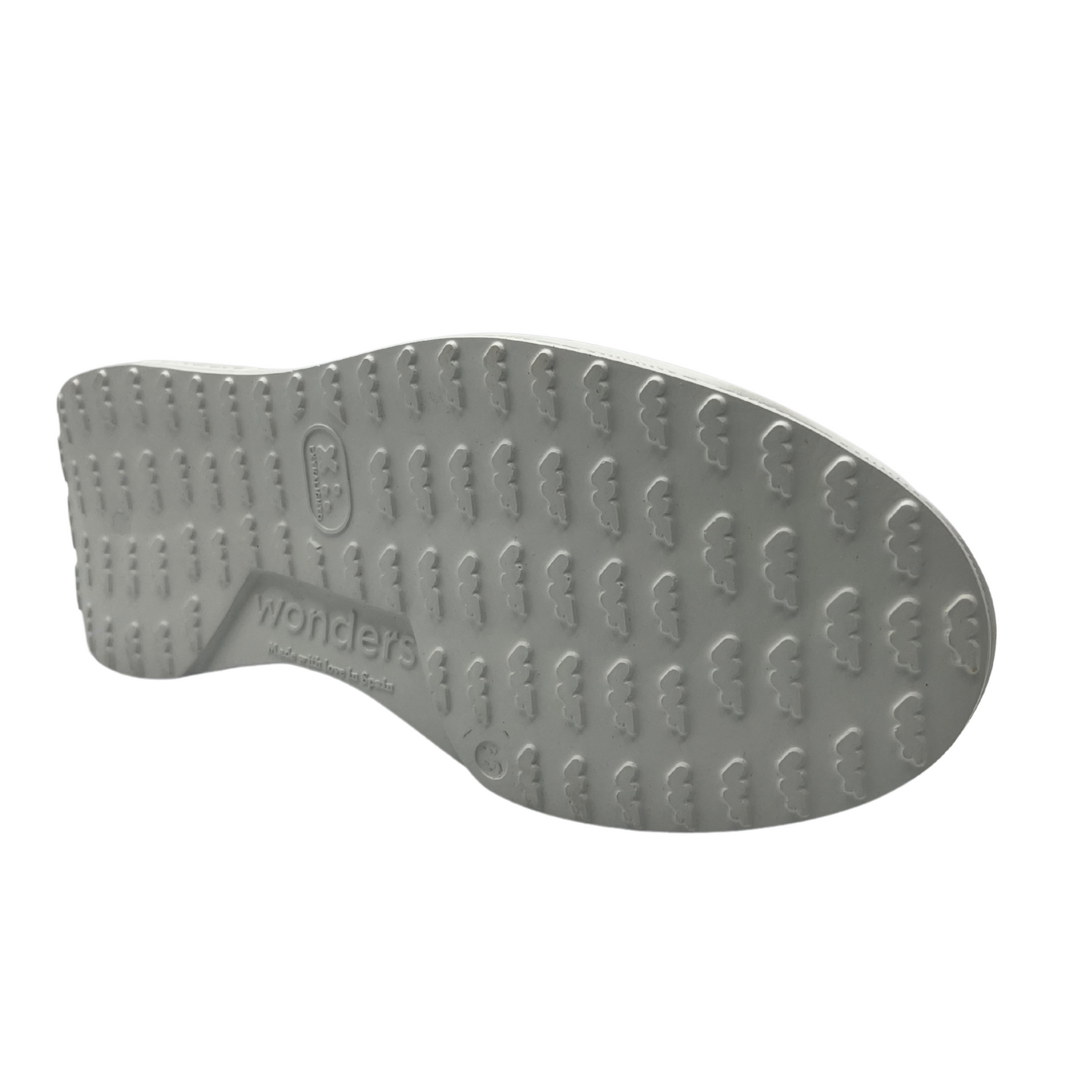 Bottom view of a white and silver leather sneaker with a padded gold collar. A quilted W on the side and ultralight white platform rubber outsole.