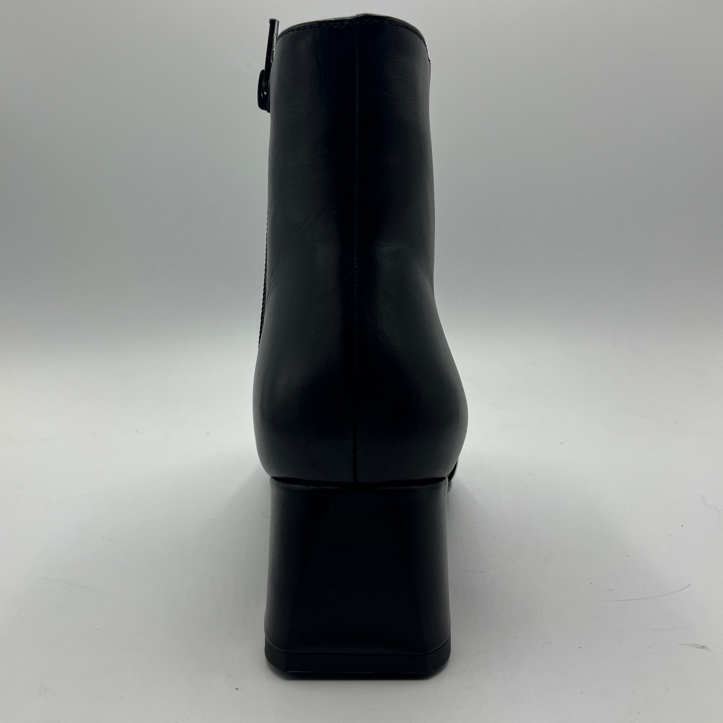 Black ankle boot on a white background