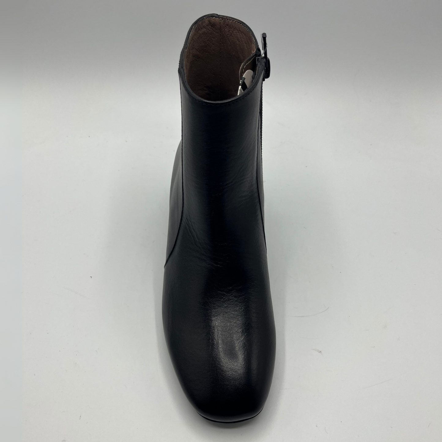 Black ankle boot on a white background
