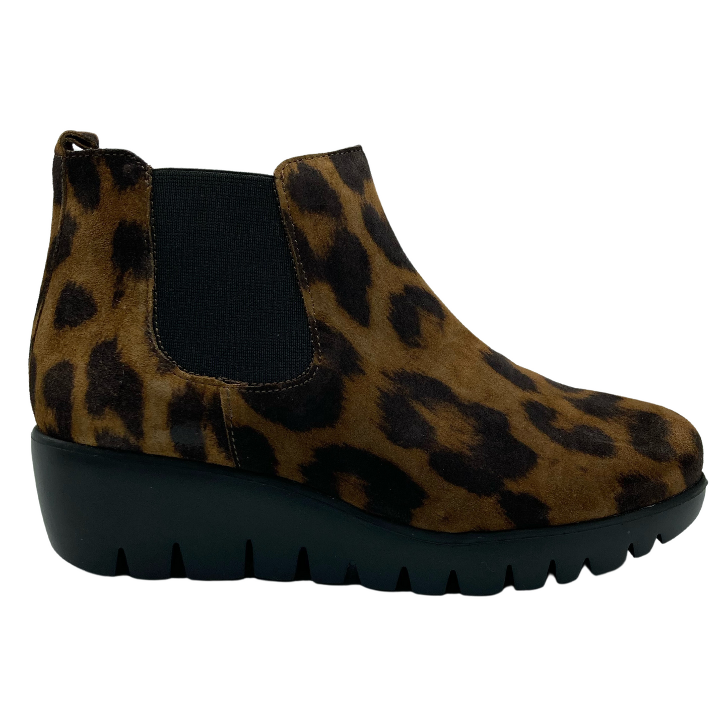 Right facing view of leopard print suede boot with black rubber wedge heel