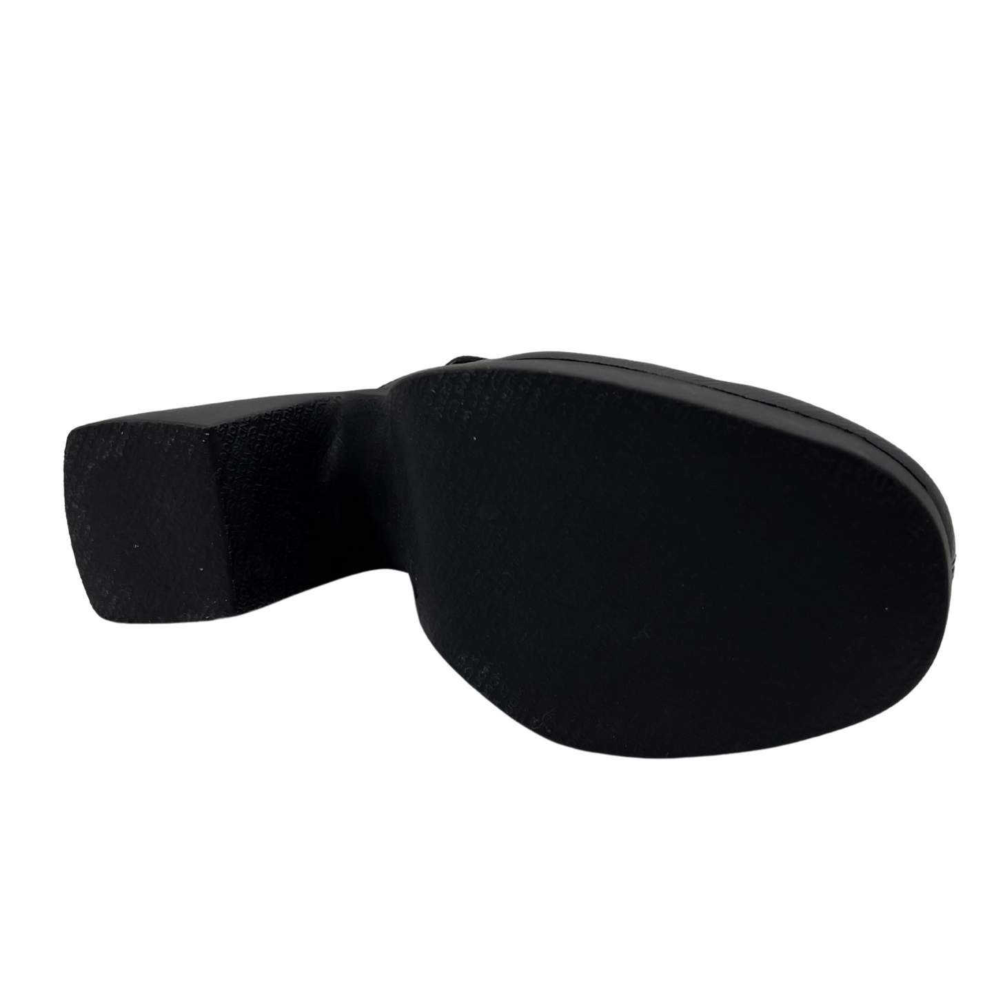 Bottom view of black leather shoe with a sling back strap with a chunky platform heel and sole