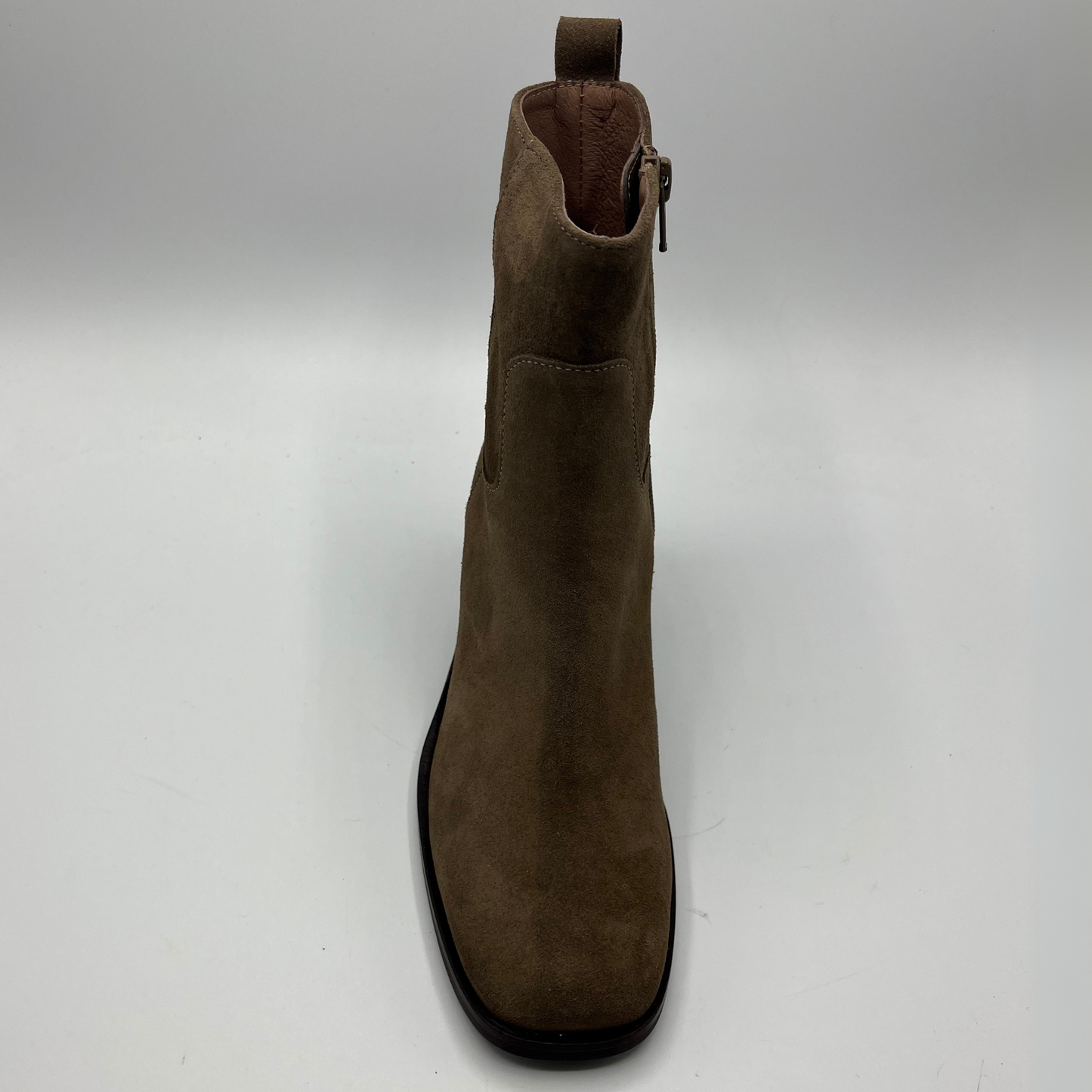 Brown ankle boot on a white background