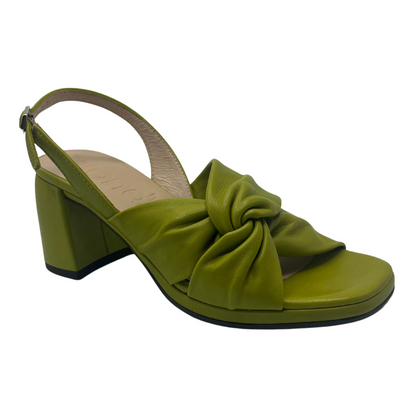 45 degree angled view of apple green leather sandal with chunky block heel and buckle strap