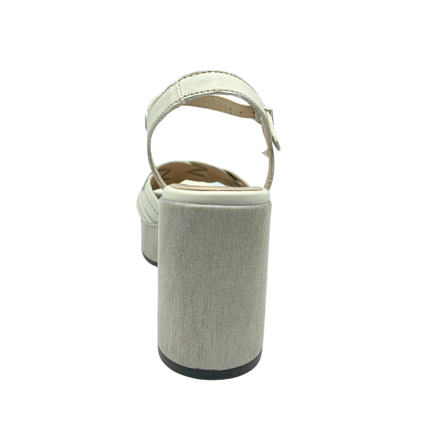 Rear view of a platform sandal in a creamy white leather. Chunky heel