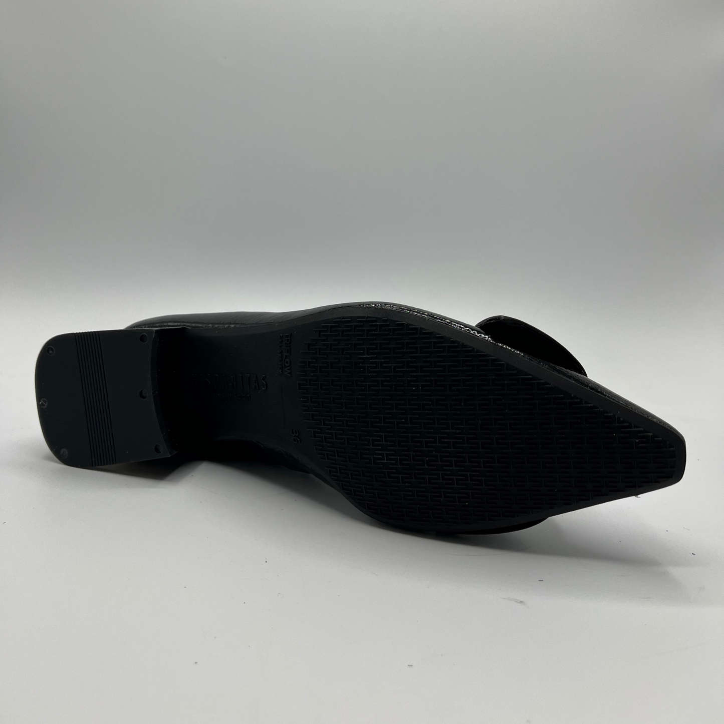Black shoe sole on a white background