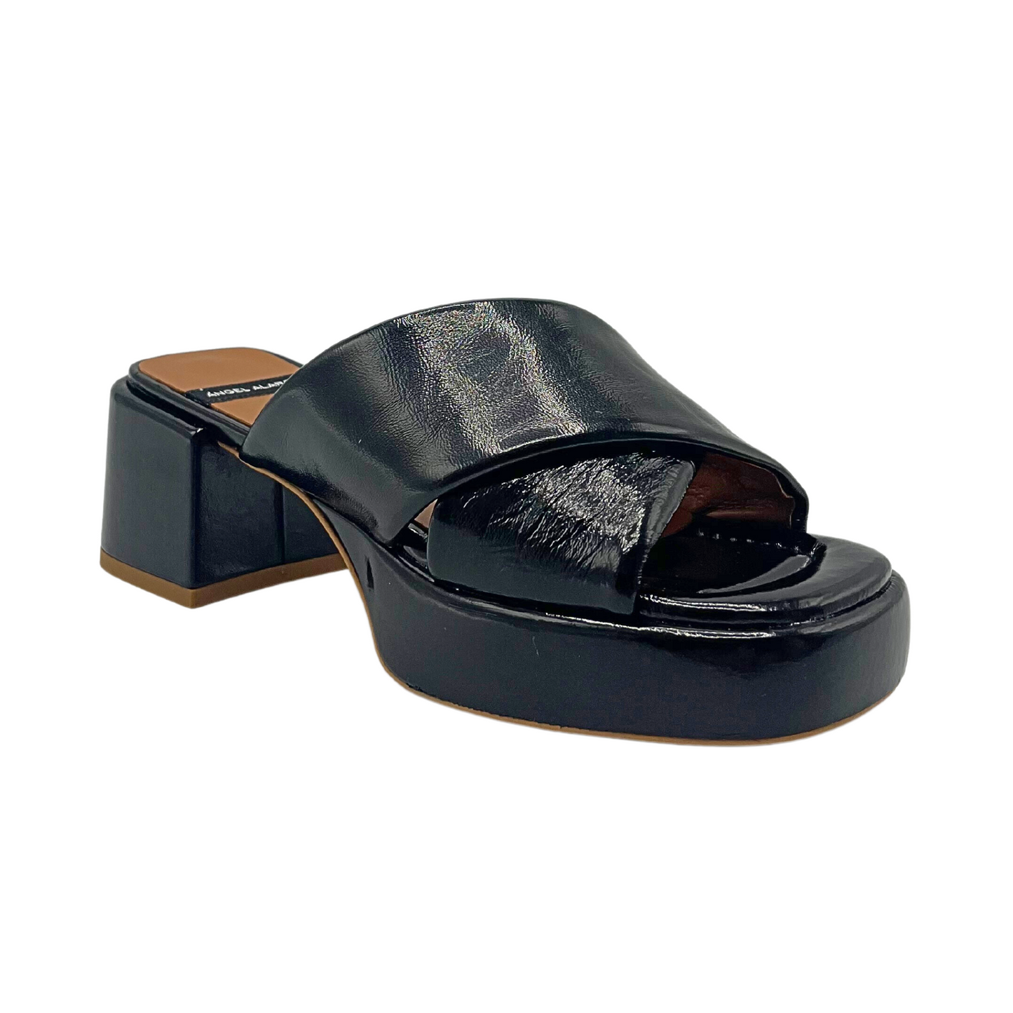 Angled side view of Angel Alarcon Muses in black patent leather. Features wide cross strap detail.
