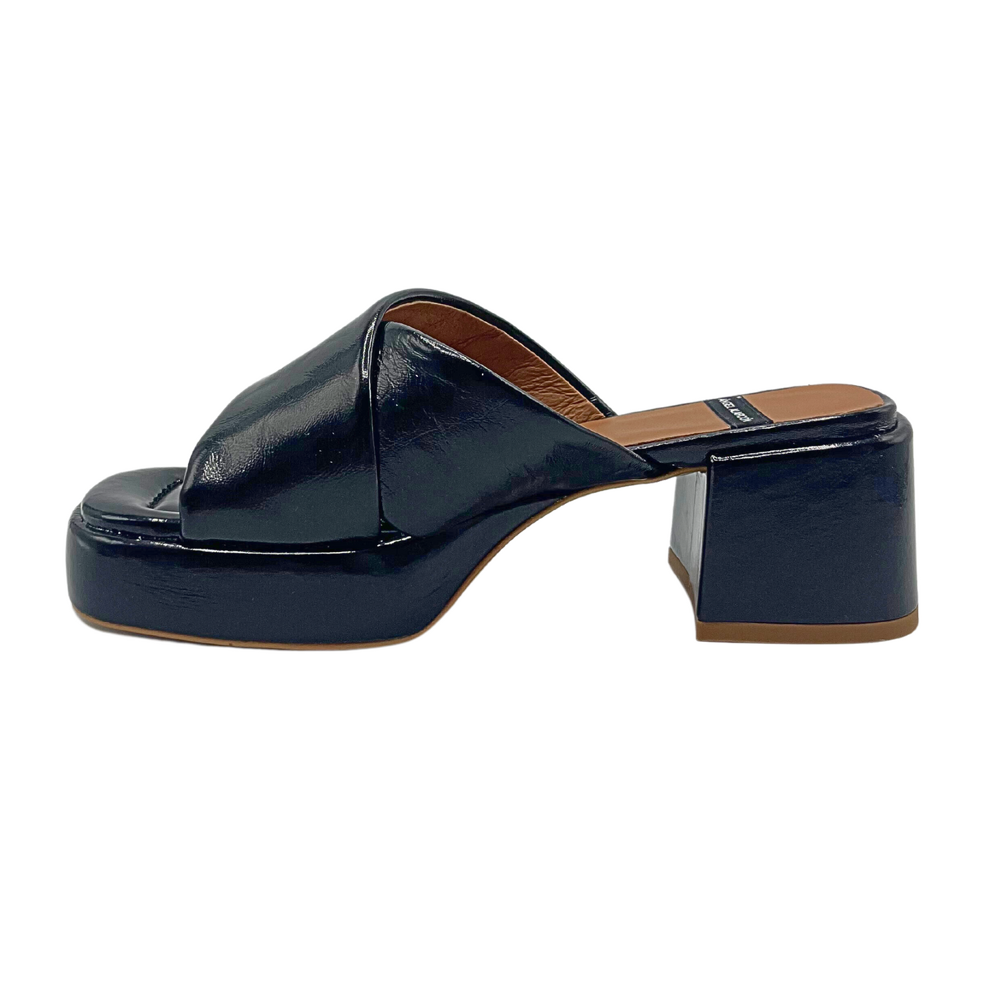 Interior view of Angel Alarcon Muses black patent mule. Shoe has the same profile from the inner and outer view.