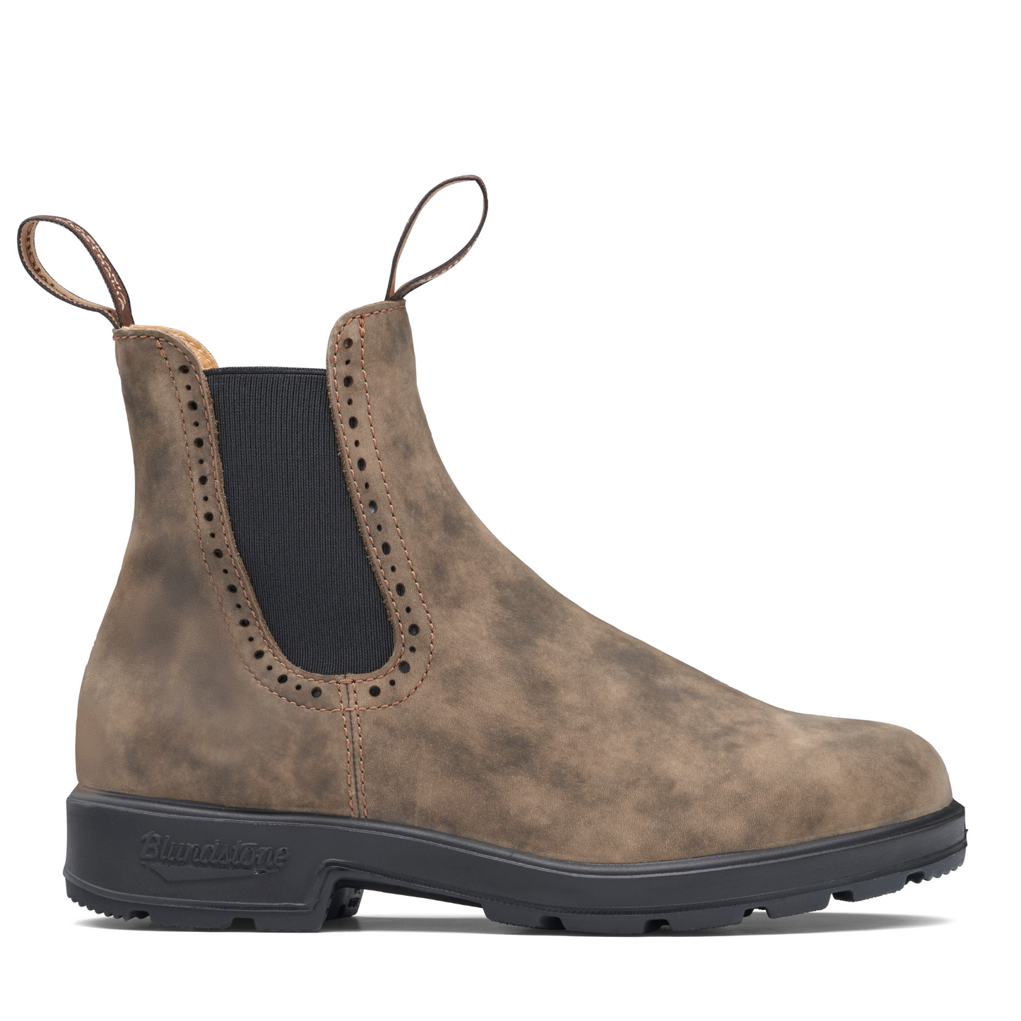 The profile view of the right boot. Rustic brown leather boot with brogue accent along the elastic side.